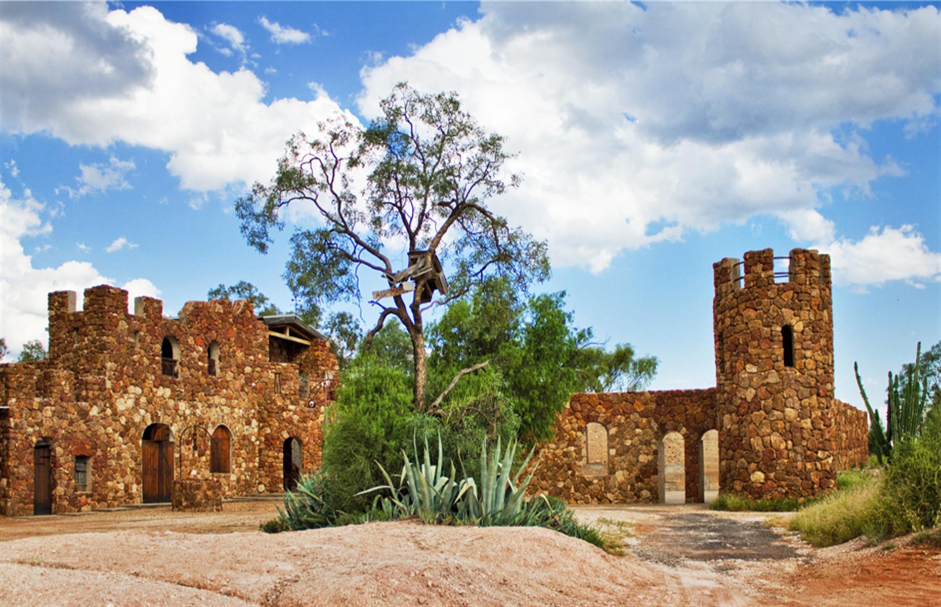 <p>A medieval-style Italian castle is the last thing you'd expect to find in the dusty opal mining town of Lightning Ridge in northwestern New South Wales. It was built by hand in the 1980s using ironstone boulders that Italian miner Vittorio Stefanato, known locally as Amigo, collected. The structure is now heritage-listed and open to visitors. There’s also the incredible opportunity to see dinosaur bones (possibly from a plesiosaur) tucked 49 feet (15m) beneath the castle, accessible via a network of tunnels. </p>  <p><a href="https://www.loveexploring.com/galleries/91760/40-of-australias-most-stunning-natural-wonders?page=1"><strong>Check out 40 of Australia's most stunning natural wonders</strong></a></p>