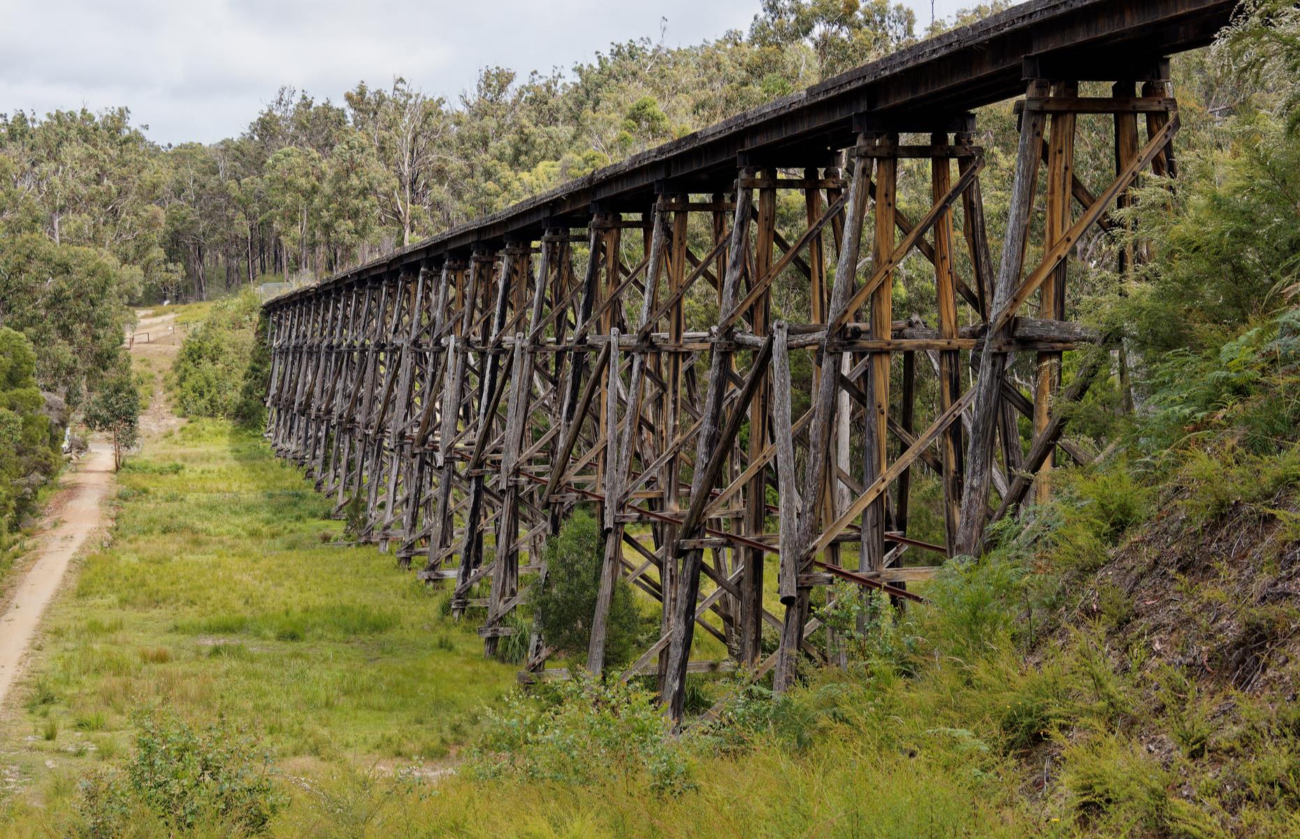 This creaky old railway bridge was built in 1916 from red ironbark and gray-box timber. It was constructed in a grueling project on tough terrain as part of an extension of the rail line between Bairnsdale to Orbost. Now heritage listed, it's the largest standing bridge of its kind in the state. It was used for over 60 years, but after being damaged by a bushfire in 1980 and subsequently falling into a poor condition, it saw its last train crossing in 1987.
