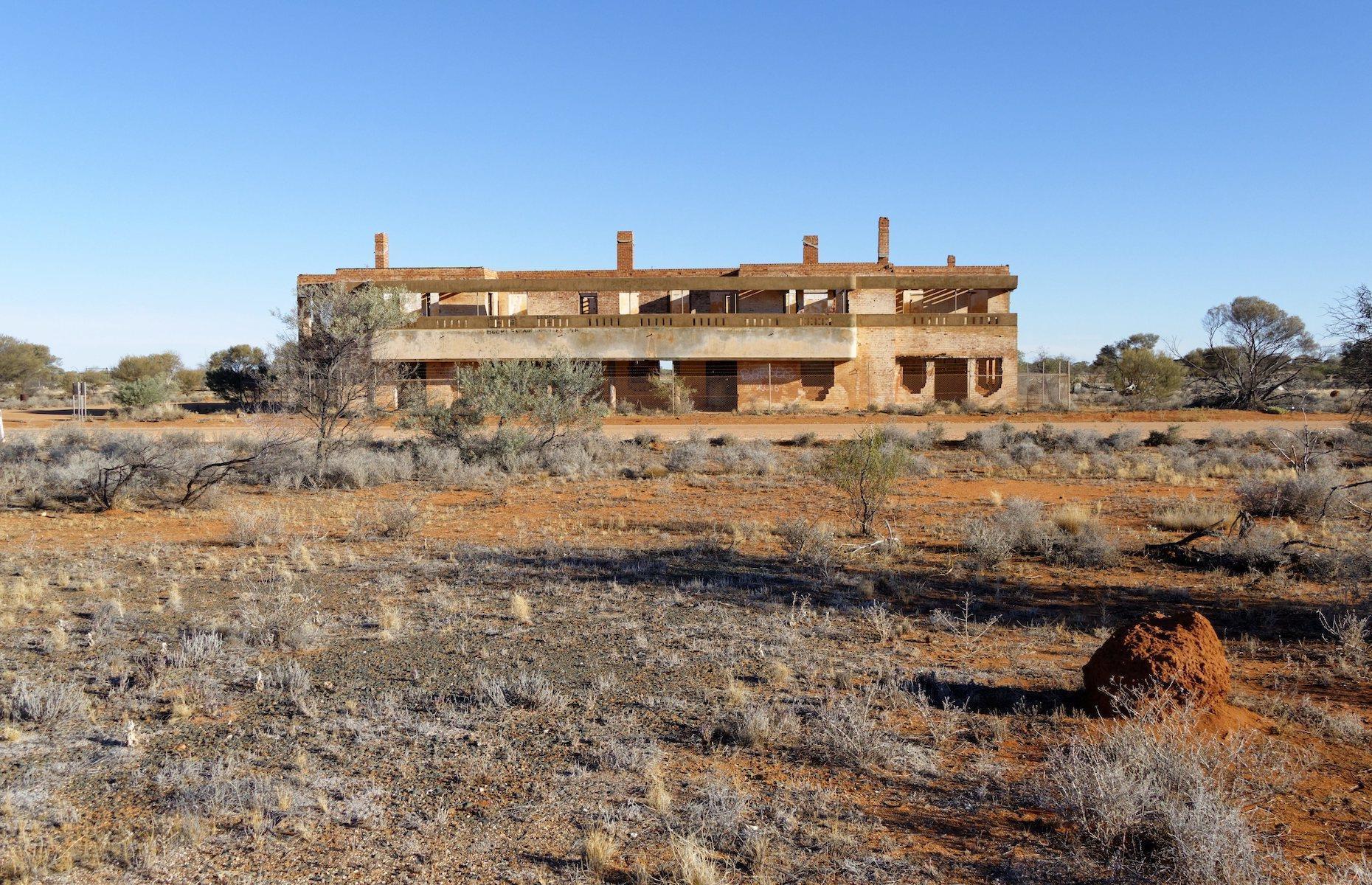 Surrounded by dusty scrub, the empty shell of this Art Deco-style hotel was once the hub of a busy mining settlement known as Big Bell. It was said to have had the longest bar in all of Australia at the time. The Big Bell Mine opened here in the early 1900s and the town was established in 1936, emptying in 1955 when the mine closed. Now the ghost town is deserted bar the occasional curious passer-by on their way to nearby Cue, an outback town known for its charming heritage buildings.
