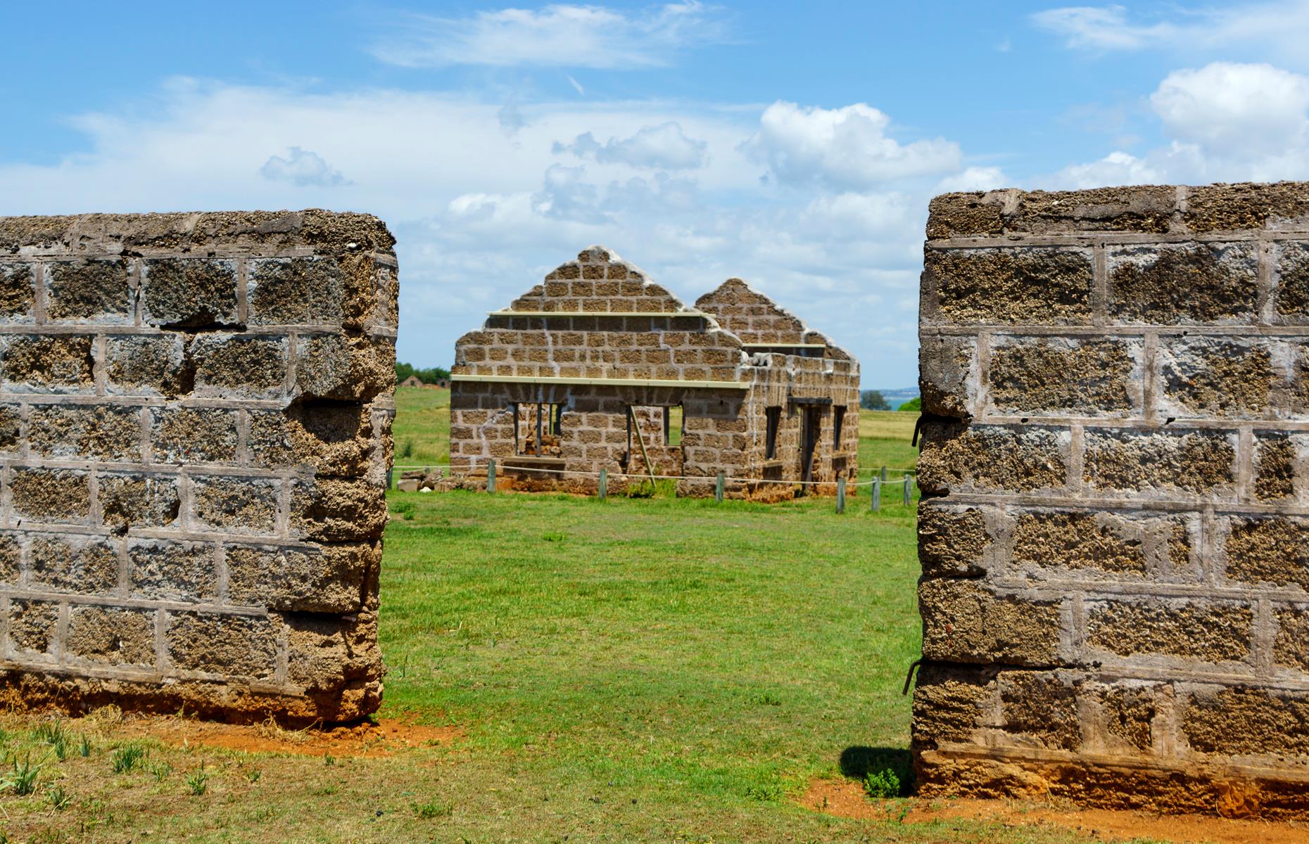 The remains of a prison stockade, including a bakery, workshops and underground tanks, can be seen on a little island in Moreton Bay just near the mouth of Brisbane River. St Helena was home to Queensland's first penal settlement, which operated here from 1867 until the 1920s. It then became a prison farm until 1932. It also houses the stone ruins of the warder accommodation, a sugar mill and the state’s first tramway.