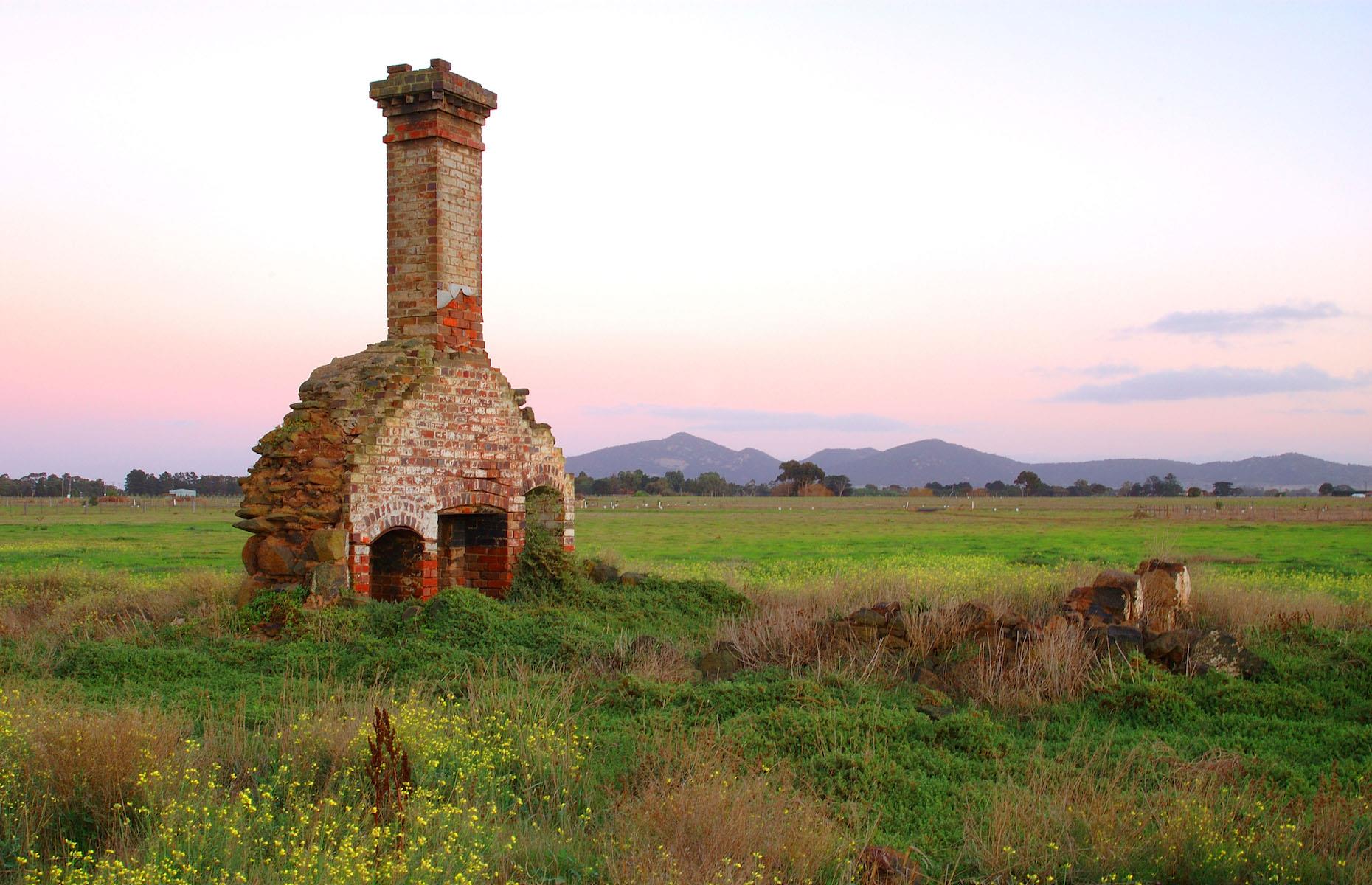 <p>The ruins of the old Rothwell Inn are a striking sight, silhouetted against a backdrop of the You Yangs in southern Victoria. What remains of the 19th-century inn can be seen by the banks of the river on the overland track between Geelong and Melbourne. Originally named the Travellers’ Rest, the public house was the start of the little rural settlement which began to grow up here in 1839.  </p>  <p><a href="https://www.loveexploring.com/galleries/90787/australias-eeriest-abandoned-towns-and-villages?page=1"><strong>Discover Australia's eeriest towns and villages</strong></a></p>