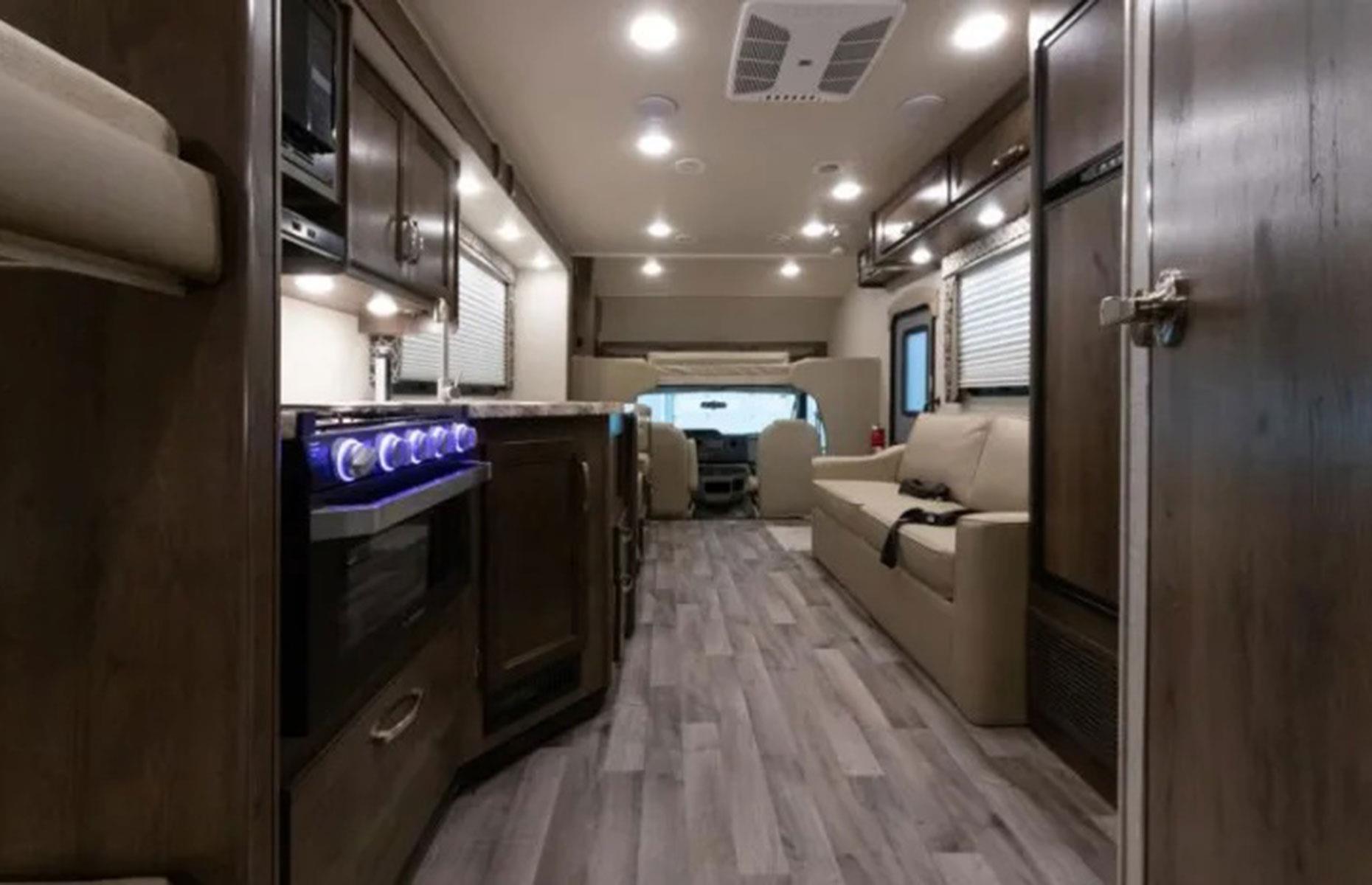 Onboard, the kitchen includes a stove, microwave, sink and refrigerator as well as pots, pans and utensils for cooking. There’s also a three-burner cooktop and double sink to make use of. Its interior includes Hudson maple cabinetry, oil-rubbed bronze hardware and vinyl flooring.