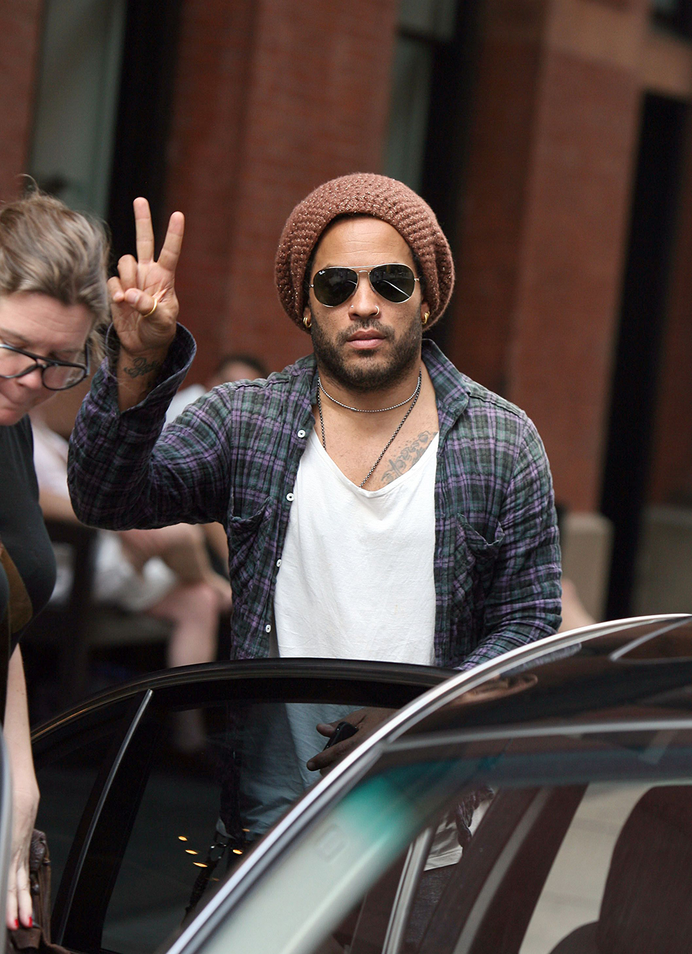 <p>Lenny Kravitz in New York on July 15, 2010. He flashed a peace sign at onlookers.</p>