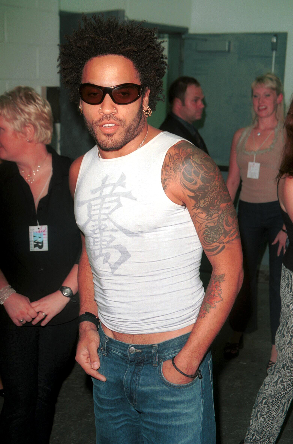 <p>Lenny Kravitz at The Rock ‘n Roll Rally in New York on August 3, 2000. He wore a tight tank top with a Chinese character on it.</p>