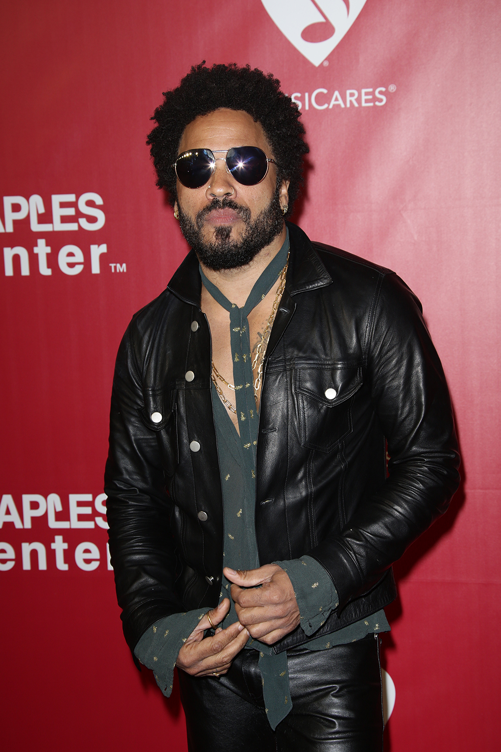 <p>Lenny Kravitz at the MusiCares Person of the Year Gala in 2016. He wore a scarf which matched his shirt.</p>