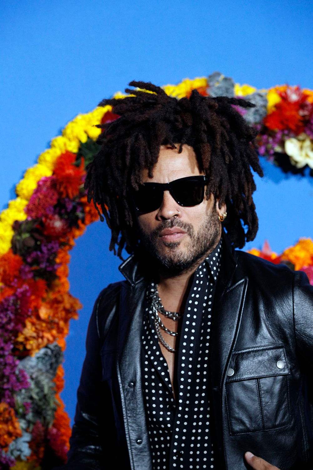 <p>Lenny Kravitz attends the opening season gala at Opera Garnier in Paris on Sep. 21, 2017. He wore his standard leather jacket and a polka dot shirt.</p>