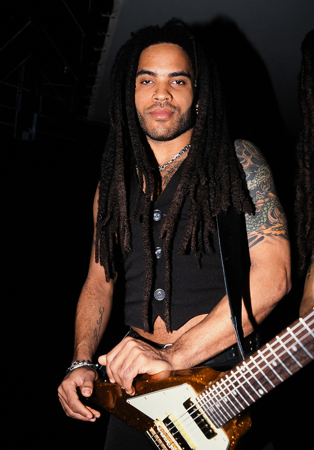 <p>Lenny Kravitz with his guitar in 1996. He looked like he was ready to rock.</p>
