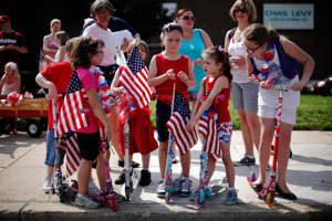 Children are seen along a Memorial Day parade route May 30, 2011, in Philadelphia, Pennsylvania.