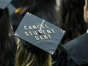 The cap of a University of Iowa graduates candidate is decorated with writing reading "Cancel student debt" during a commencement ceremony for the College of Liberal Arts and Sciences, Saturday, May 14, 2022, at Carver-Hawkeye Arena in Iowa City, Iowa. (Joseph Cress/Iowa City Press-Citizen via AP)