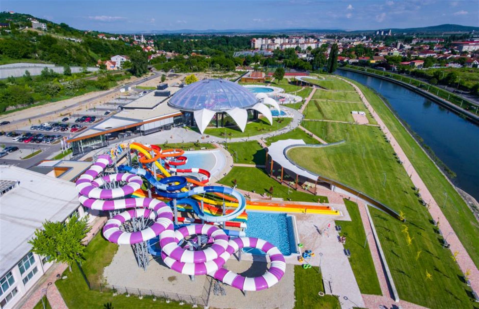<p>Whether you're leaping about in the wave pool, doing lengths in the Olympic-sized pool, whizzing down slides or walking the plank on the pirate ship, <a href="https://aquapark-nymphaea.ro/?jjj=1652259828164">Romania's favourite water parks</a> is sure to delight all the family. Parents can take it in turns to relax in the spa which has a Turkish bath, a range of geothermal water pools, steam room, sauna and cold room.</p>