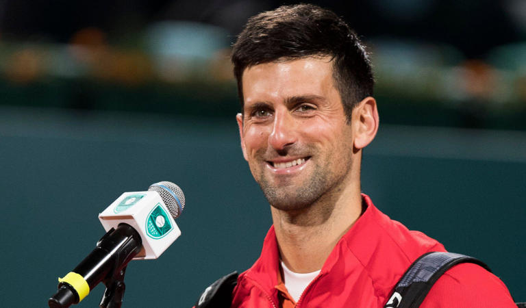 Novak Djokovic in front of a mike