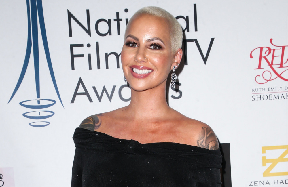 amber rose insists she and chris rock are just 'good friends' following dating rumour