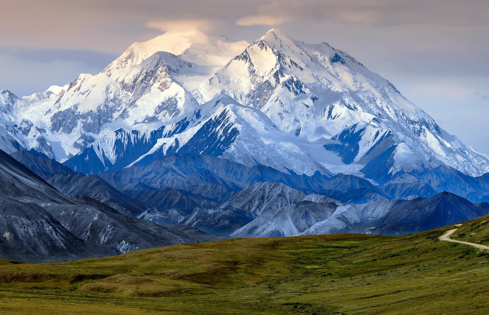 <p>Formerly named Mount McKinley National Park after US president William McKinley, the National Park Service changed the park's name to Denali in 2015, on the eve of its 100th anniversary, to acknowledge its original, native name. Denali is an Athabaskan word meaning "the tall one", referring to Mount Denali (also formerly Mount McKinley), which towers an impressive 20,310 feet (6,190m) above sea level.</p>  <p><strong><a href="https://www.loveexploring.com/galleries/107668/historic-photos-of-americas-national-parks">Historic photos of America's national parks</a></strong></p>