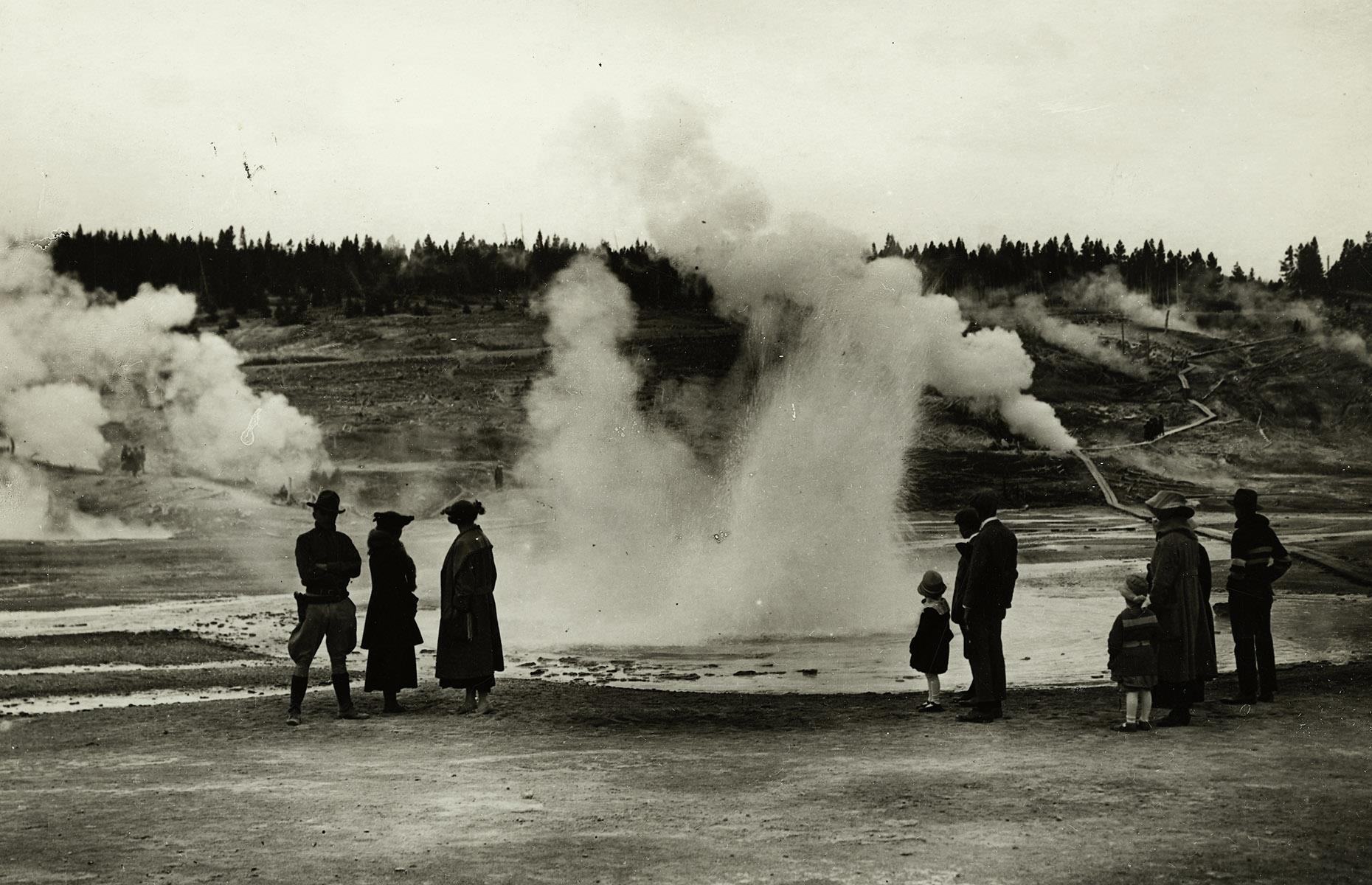 Yellowstone's geothermal wonders were, and still are, a major draw of the park. There are more than 10,000 thermal features enveloped within the site today, from belching mud pots and hot springs to geysers shooting water as high as 300 feet (91m) – that record belongs to Steamboat Geyser. Here, visitors from 1920 look on in awe as they explore one of Yellowstone's steaming geyser basins.