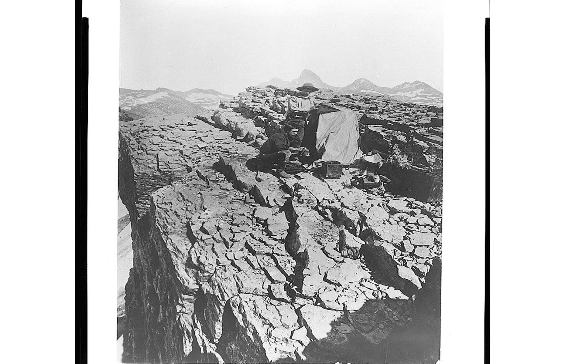 Among Hayden's team was William Henry Jackson, an American photographer who's become known as the first to capture the park on camera. His stirring photographs went some way to convincing officials to establish the national park. He's snapped here on a mountaintop surrounded by his equipment.