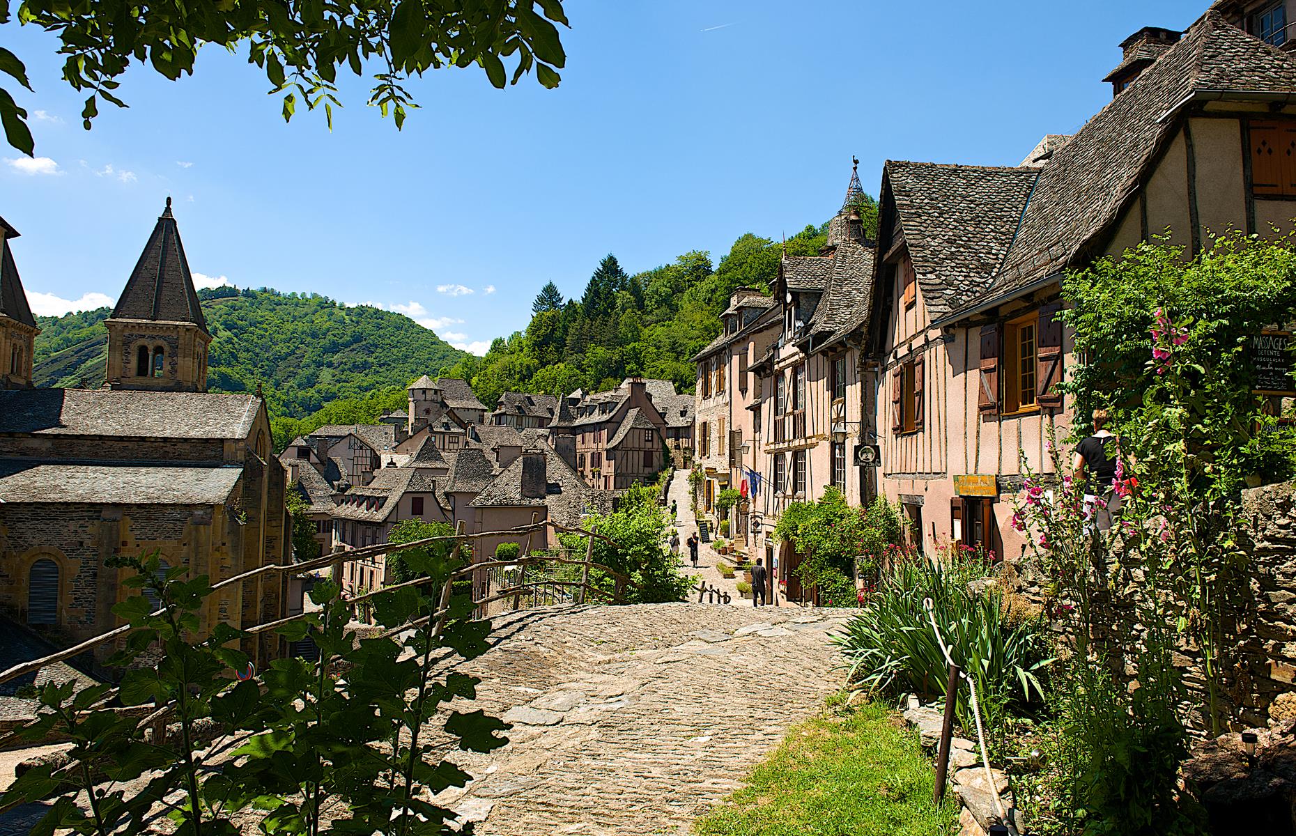 <p>Another of France’s postcard-perfect medieval villages inspired the filmmakers for Disney’s 2017 live-action remake of the iconic fairy tale, featuring Emma Watson. This time the production designer largely modelled the bookish heroine's village, the fictional Villeneuve, on Conques after scouting out the location. With tight cobbled streets, fountains and wonky timbered houses complete with wooden shutters and windowsills festooned in flowers, this sleepy village in the south of France is everything you could want as the home of a Disney heroine.</p>