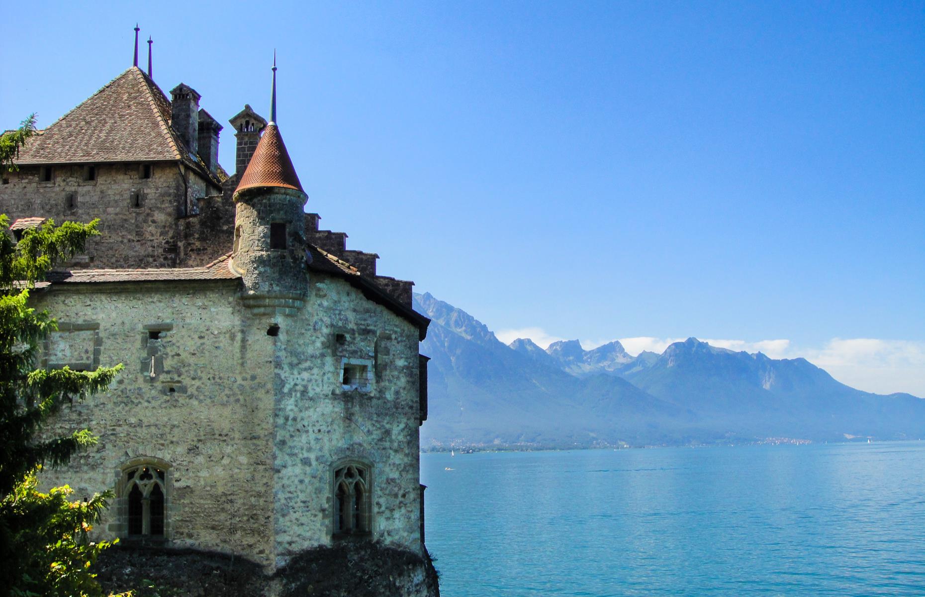 <p>Sat on a rocky isle on the banks of Lake Geneva in the shadow of the mountains, Château de Chillon has an ethereal setting and it wouldn’t seem unfeasible to see a mermaid emerging from the pretty blue waters that surround it. It was the setting of this handsome fortress that fired the imagination of the animators creating Eric’s castle in <em>The Little Mermaid</em>. Just near Montreux, it’s Switzerland’s most visited historic site today.</p>  <p><a href="https://www.loveexploring.com/galleries/109255/the-worlds-most-popular-movie-locations?page=1"><strong>Now discover the world's most popular movie locations</strong></a></p>