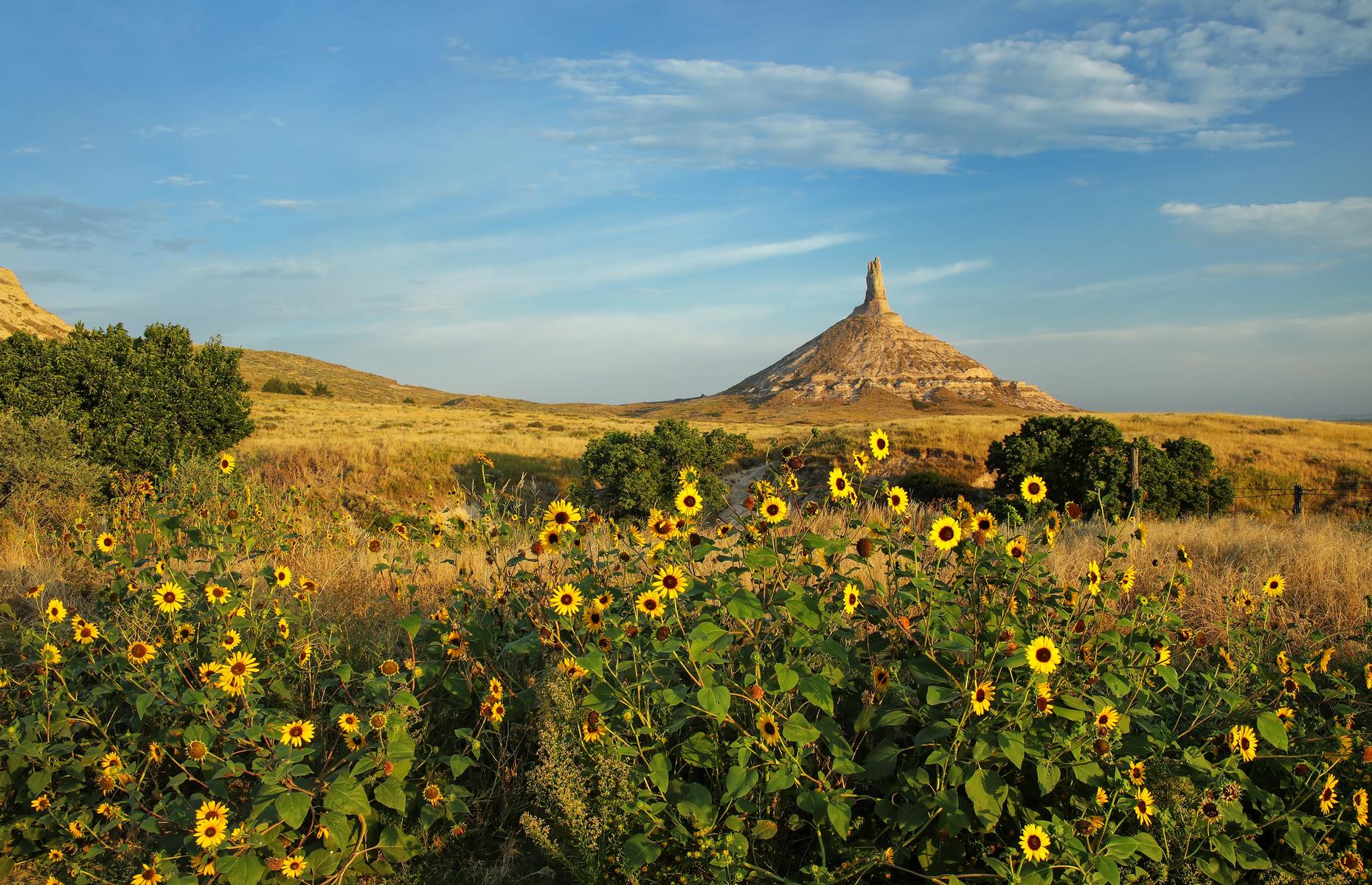 <p>A curious formation in Nebraska's Morrill County, <a href="https://history.nebraska.gov/rock">Chimney Rock</a> is a key stop along the Oregon Trail, a National Historic Trail that traces 2,000-plus miles (3,219km) from east to west. As such, this natural landmark is not just a photo opportunity but also a symbol of the American pioneer and westward migration during the 1800s. Make time to stop by the visitor center, which educates the public on this intriguing hunk of rock and its wider significance.</p>