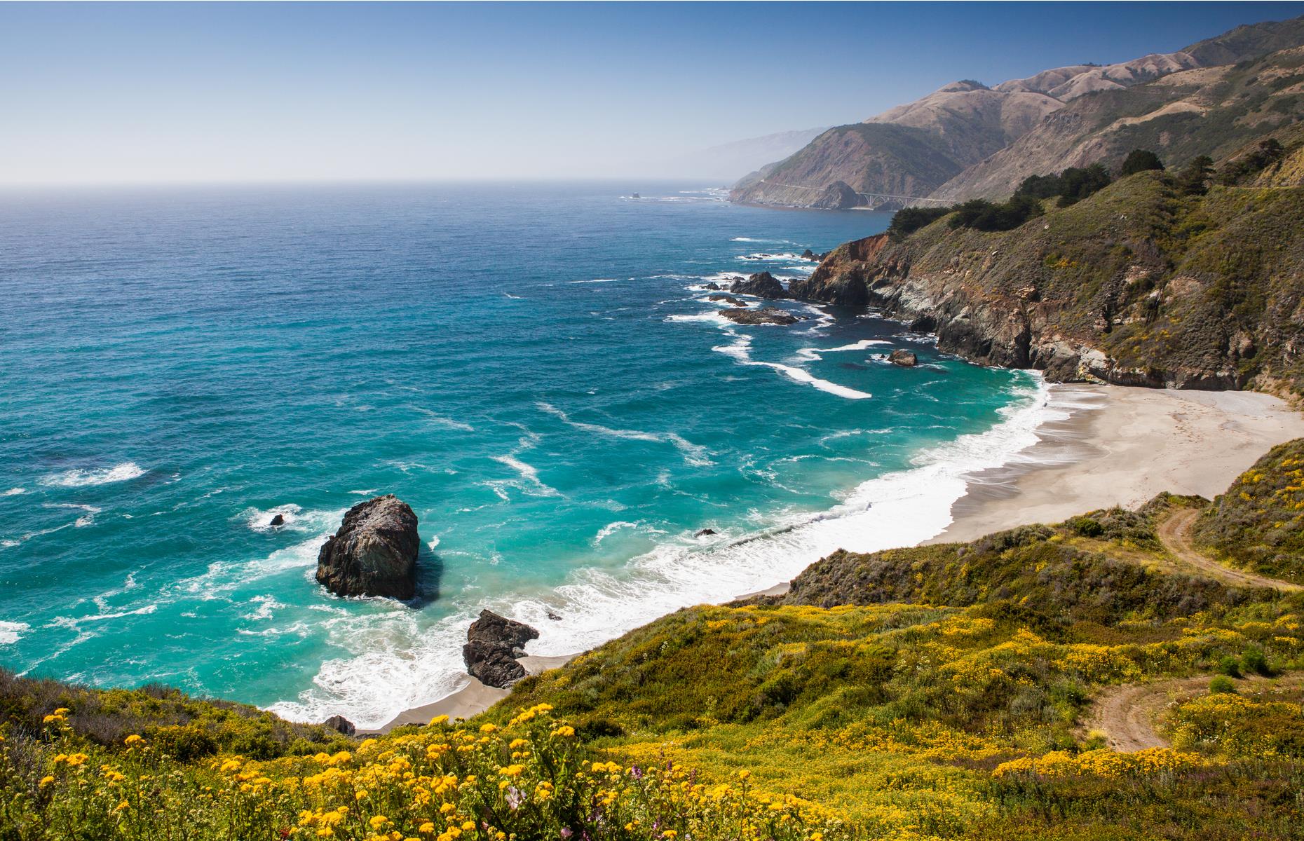<p>Few stretches of road inspire so much awe and admiration as the stretch of the Pacific Coast Highway between Carmel and San Simeon, where cliffs protect caramel beaches and Monterey pines blanket the slopes. <a href="https://www.visitcalifornia.com/uk/destination/spotlight-big-sur">Big Sur</a> is even more beautiful viewed from horseback. Trail rides follow redwood-shaded paths in Andrew Molera State Park and end with a canter on the soft sand.</p>  <p><strong><a href="https://www.loveexploring.com/guides/88203/californias-central-coast-road-trip-the-top-things-to-do-where-to-stay-">Find our guide to the perfect Central Coast road trip in California</a></strong></p>