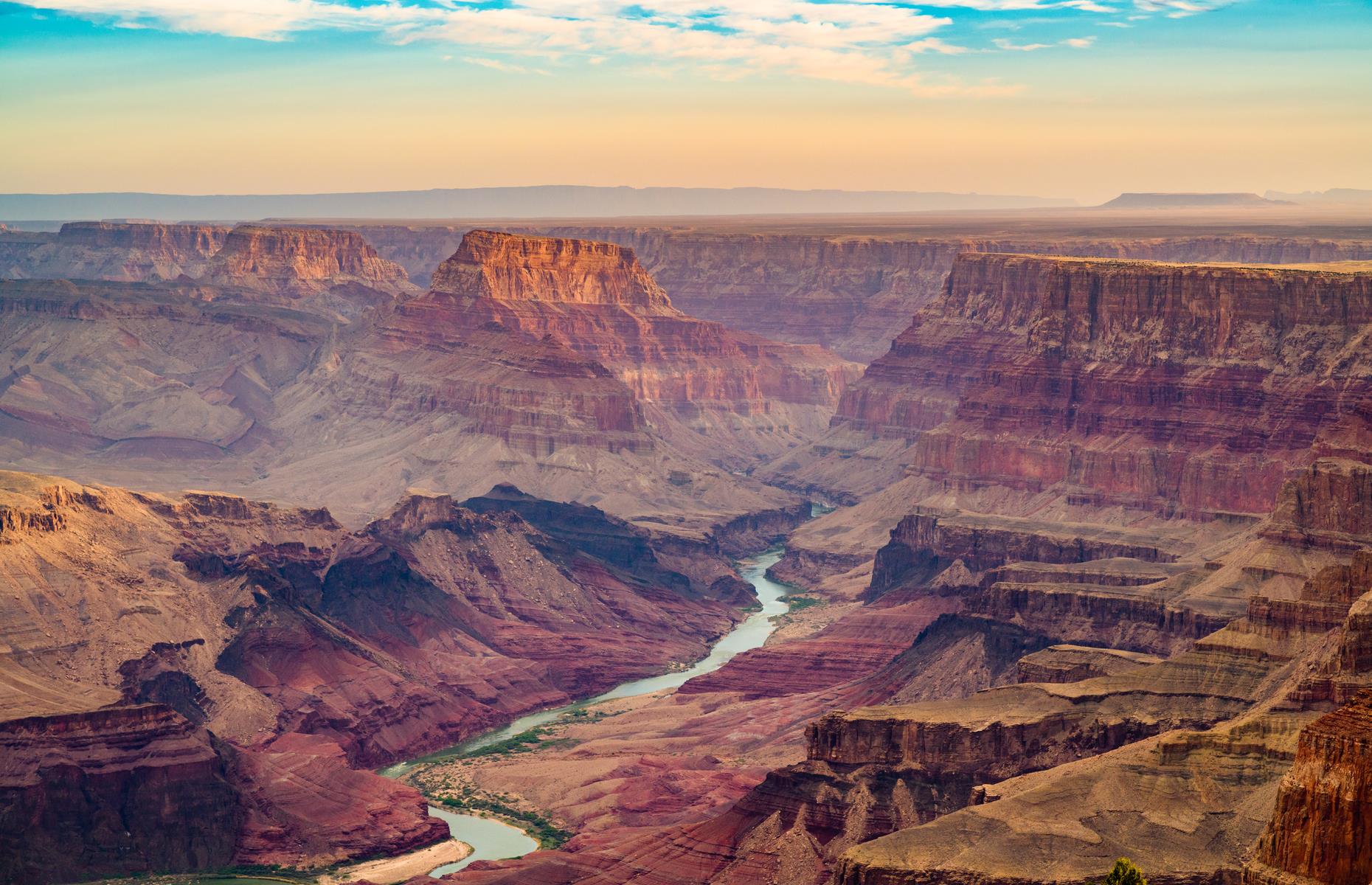 <p>The granddaddy of them all is high on many people’s bucket lists for good reason. Whether viewed from the terrifying glass-floored <a href="https://grandcanyonwest.com/explore/west-rim/skywalk-eagle-point/">Skywalk</a>, which curves 70 feet (21.3m) above the void, from a helicopter or from one of the many overlooks around the rim, there’s one guarantee: you’ll feel tiny. The <a href="https://www.nps.gov/grca/planyourvisit/index.htm">South Rim</a> is considered the best for sunrise – and those blazing reds and oranges are worth dragging yourself up for. </p>  <p><strong><a href="https://www.loveexploring.com/galleries/86466/the-worlds-stunning-sunrises-will-brighten-up-your-day?page=1">The world's most stunning sunrises will brighten up your day</a></strong></p>