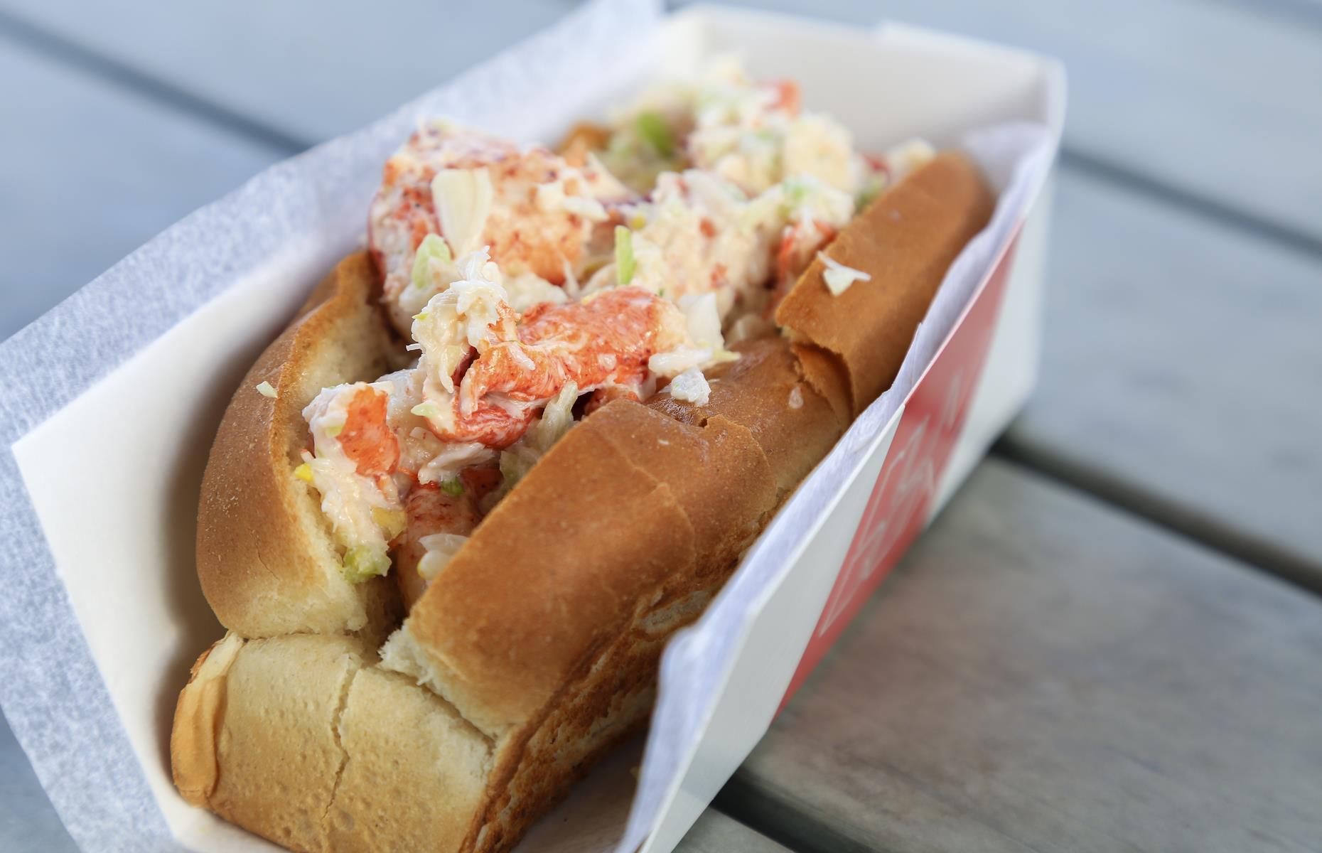 <p>If you only eat one thing while traveling down Maine’s southern coast, make it a lobster roll (or two). The tender meat is served in soft, slightly chewy rolls and drenched in melted butter and it’s as addictive as it sounds. Find them anywhere from waterside restaurants to tiny roadside shacks like legendary Wiscasset spot <a href="https://www.redseatsmaine.com/">Red’s Eats</a>, which promises “at least” one whole lobster per roll.</p>