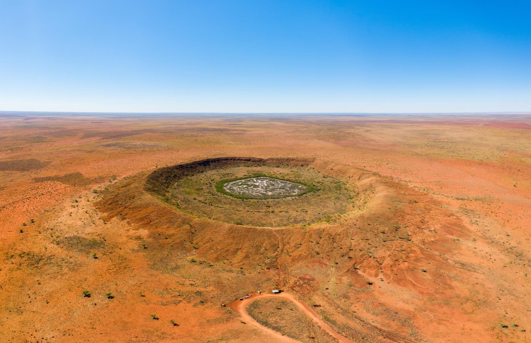 <p>Pretty much perfectly circular, this gaping hole is the second largest crater in the world where fragments of a meteorite have been collected. Lying south of remote settlement Halls Creek in the Great Sandy Desert, the explosion crater has a diameter of 2,887 feet (880m) and is 197 feet (60m) deep. Thought to have been created around 300,000 years ago, the crater has been well preserved because of its desert setting. You can walk around its rim or take an aerial tour from Halls Creek for the most dramatic views. </p>  <p><a href="https://www.loveexploring.com/galleries/135993/abandoned-australia-101-spinetingling-places-you-wont-want-to-visit?page=1"><strong>Abandoned Australia: 101 spine-tingling places you won't want to visit</strong></a></p>