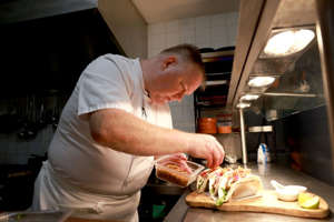 Chef Dean Eccles at work in the kitchen.