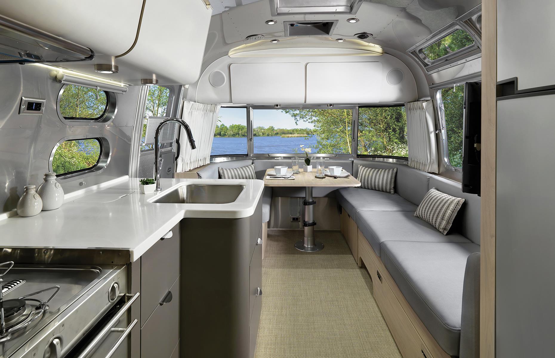 <p>At the other end of the spectrum, the company's Globetrotter model comes as a 30-foot (9m) trailer with an extensive kitchen, lounge seat dining area, USB outlets, climate control and rear-view cameras. For an even bigger trailer, the Classic comes in 33 feet (10m) and comfortably sleeps up to five people. </p>