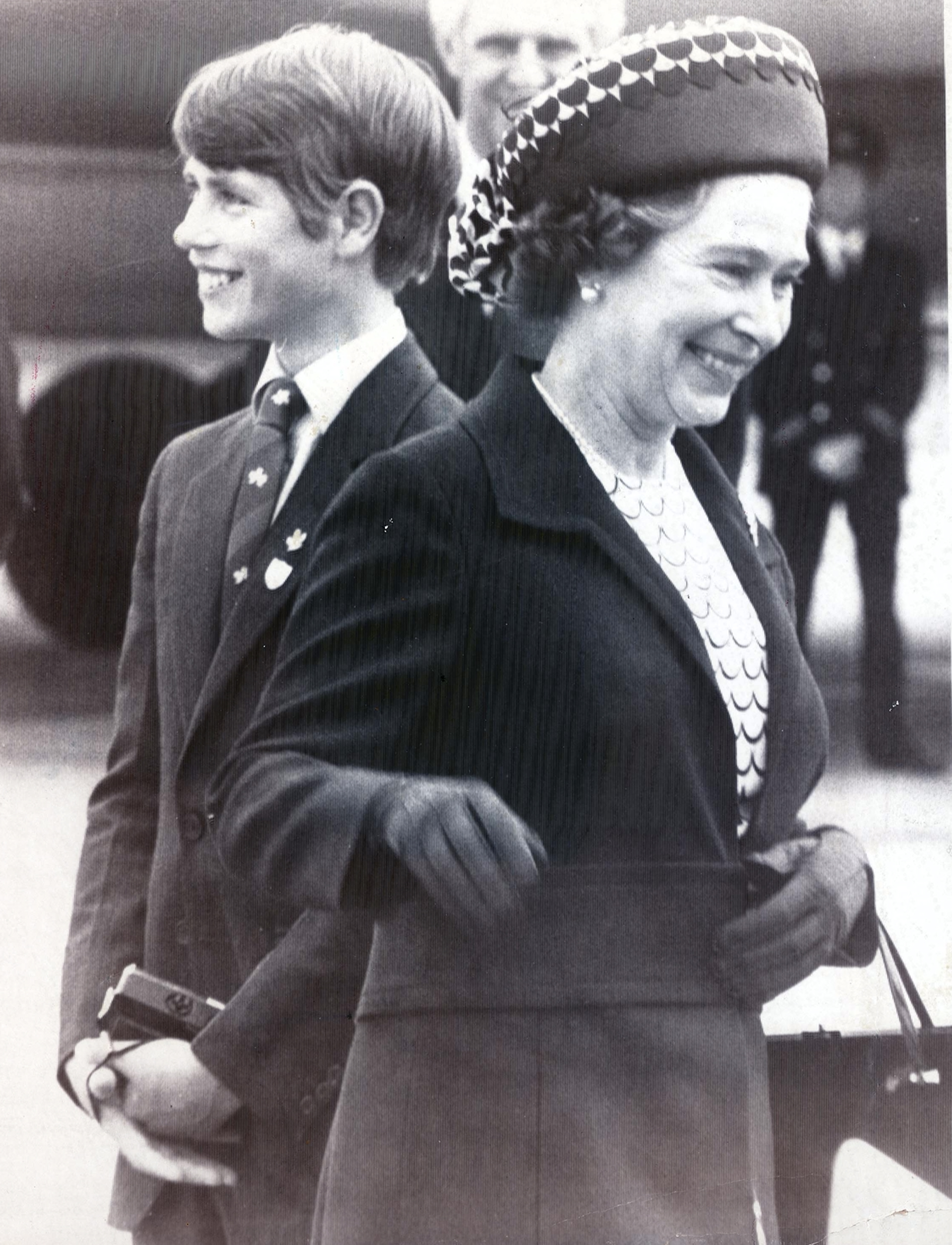 <p>Queen Elizabeth II and son Prince Edward laughed after she she stepped off a Boeing 707 gangway at Glasgow Airport in Scotland and slipped, almost landing on his toes, on Aug. 7, 1978.</p>