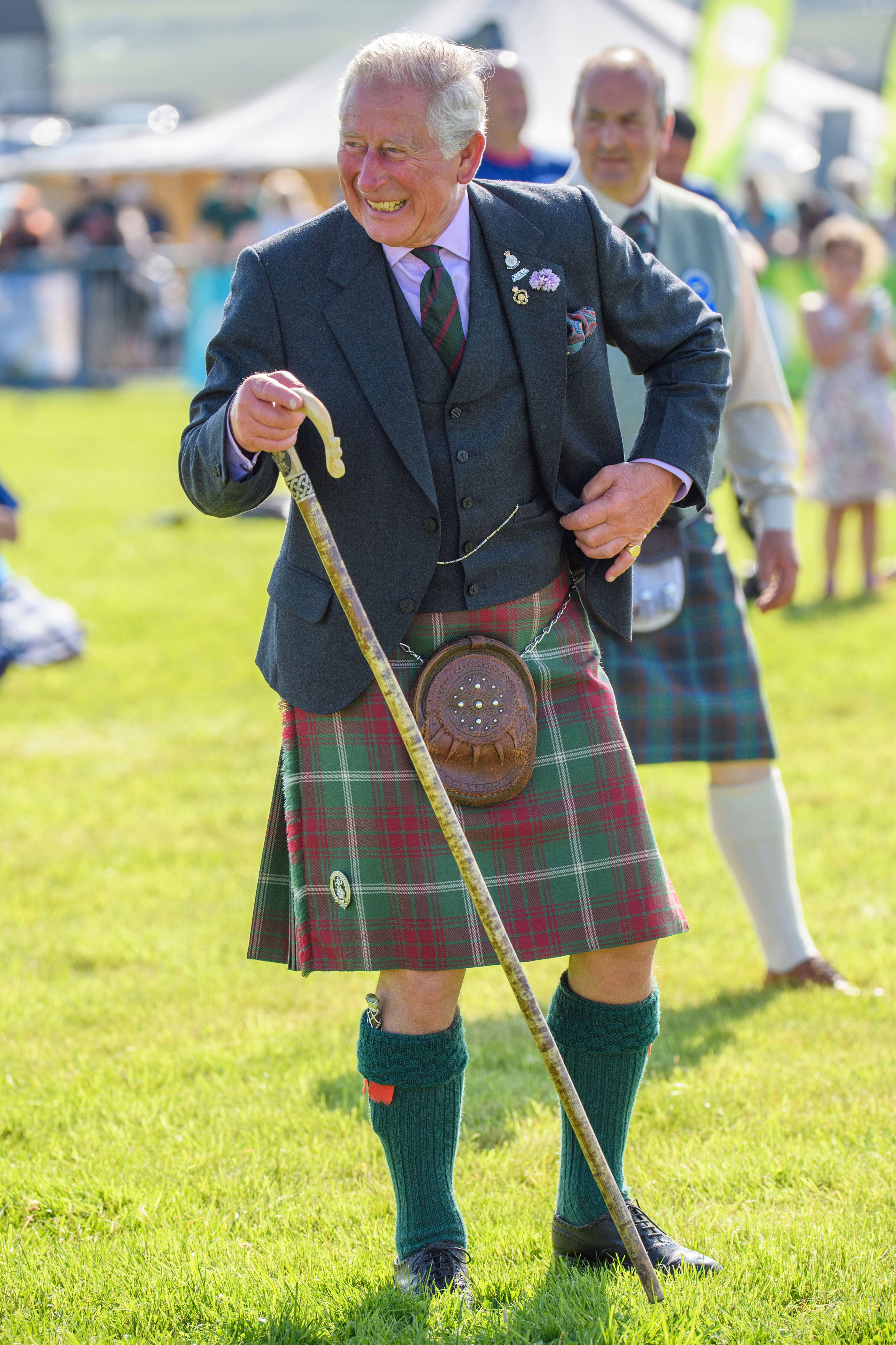 <p>Prince Charles had a laugh at the Mey Highland Games at the John O'Groats showground in Scotland on Aug. 3, 2019. But it certainly wasn't his first time at a highland games competition...</p>
