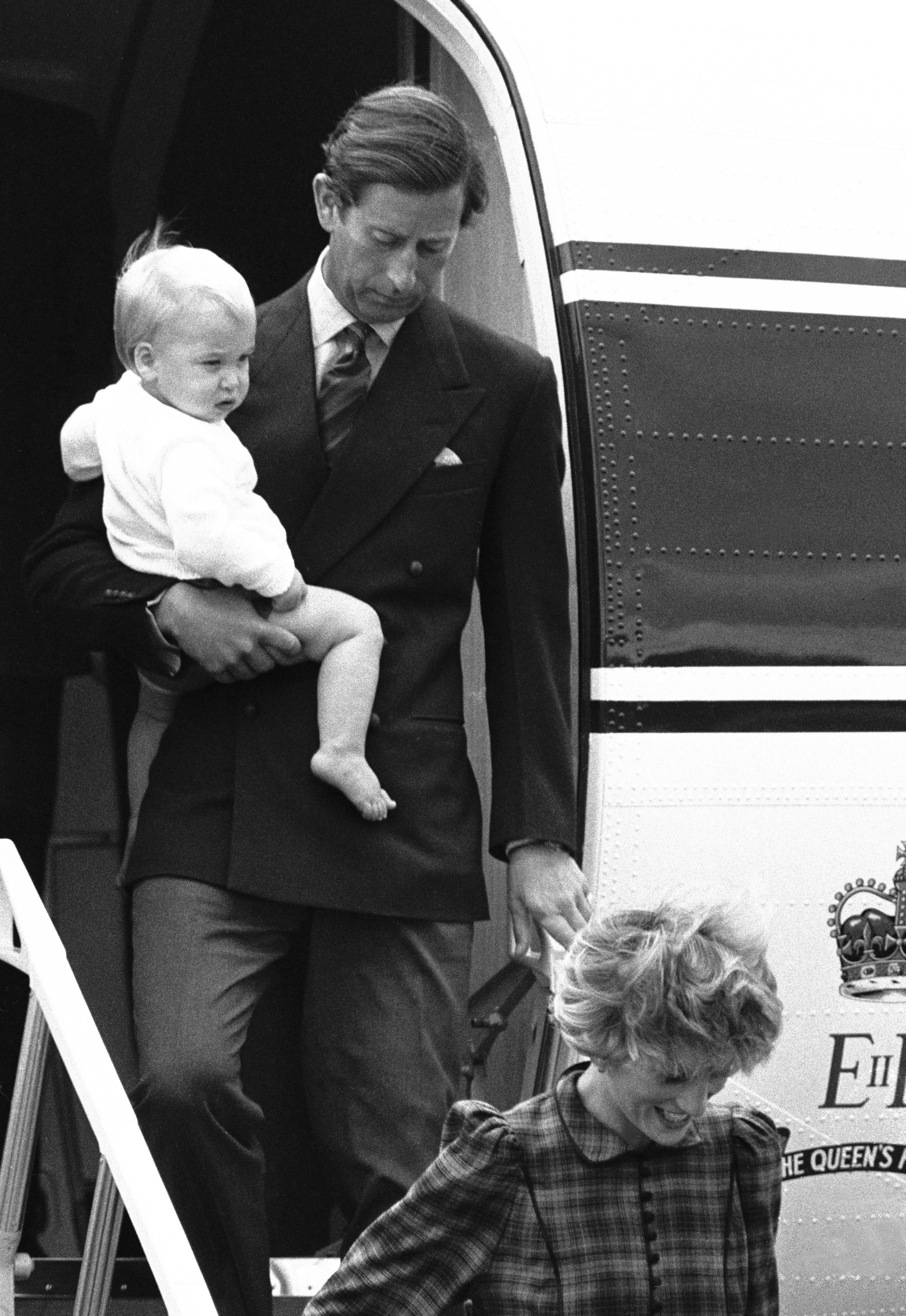<p>Prince Charles arrived on the queen's flight at Aberdeen Airport in Scotland on Aug. 15, 1983, and exited after Princess Diana while carrying a young <a href="https://www.wonderwall.com/celebrity/profiles/overview/prince-william-482.article">Prince William</a> before heading to their family's Balmoral estate.</p>