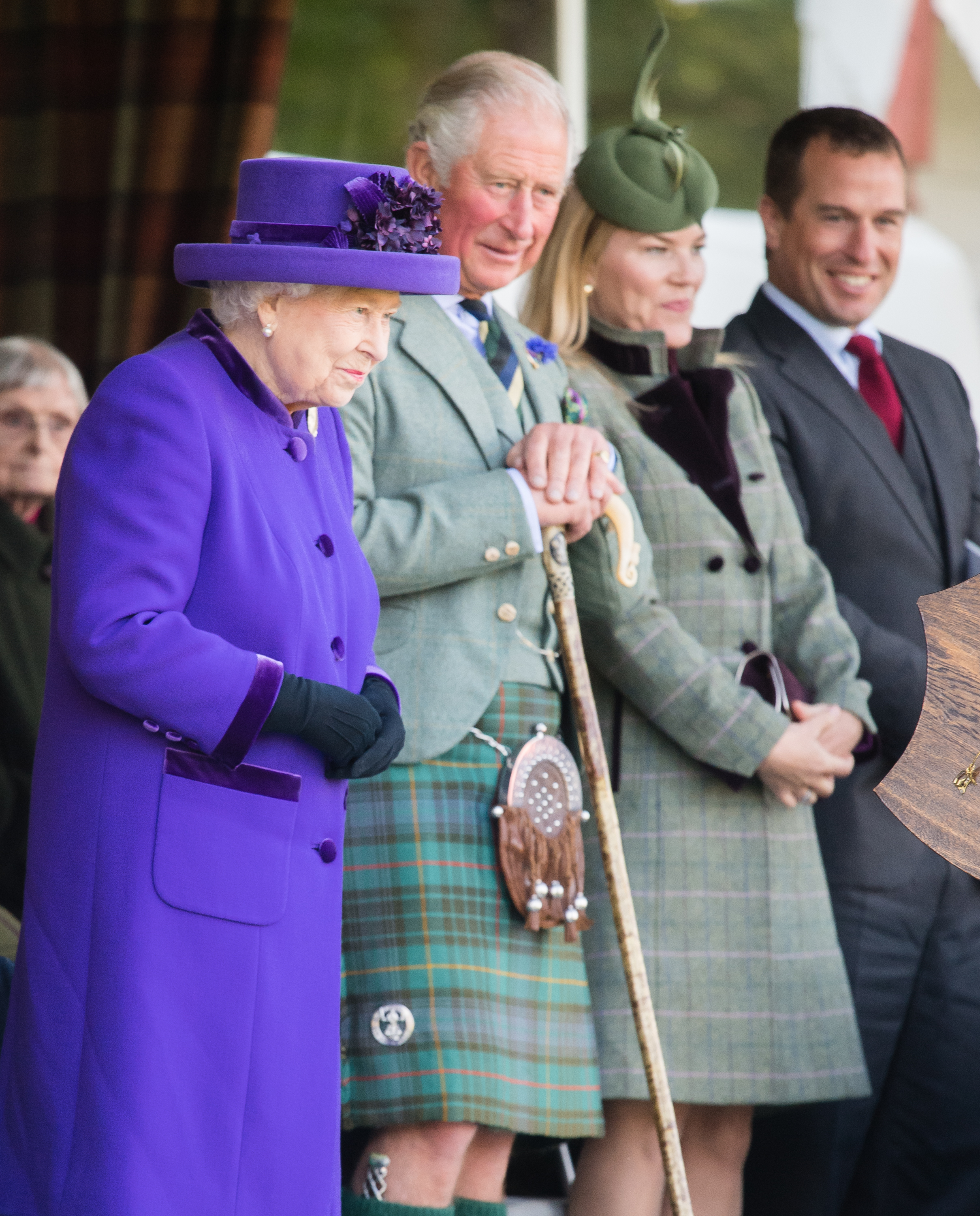<p>Queen Elizabeth II, son Prince Charles and grandson Peter Phillips, along with Peter's then-wife Autumn Phillips, attended the 2019 Braemar Highland Games in Braemar, Scotland, on Sept. 7, 2019. </p>