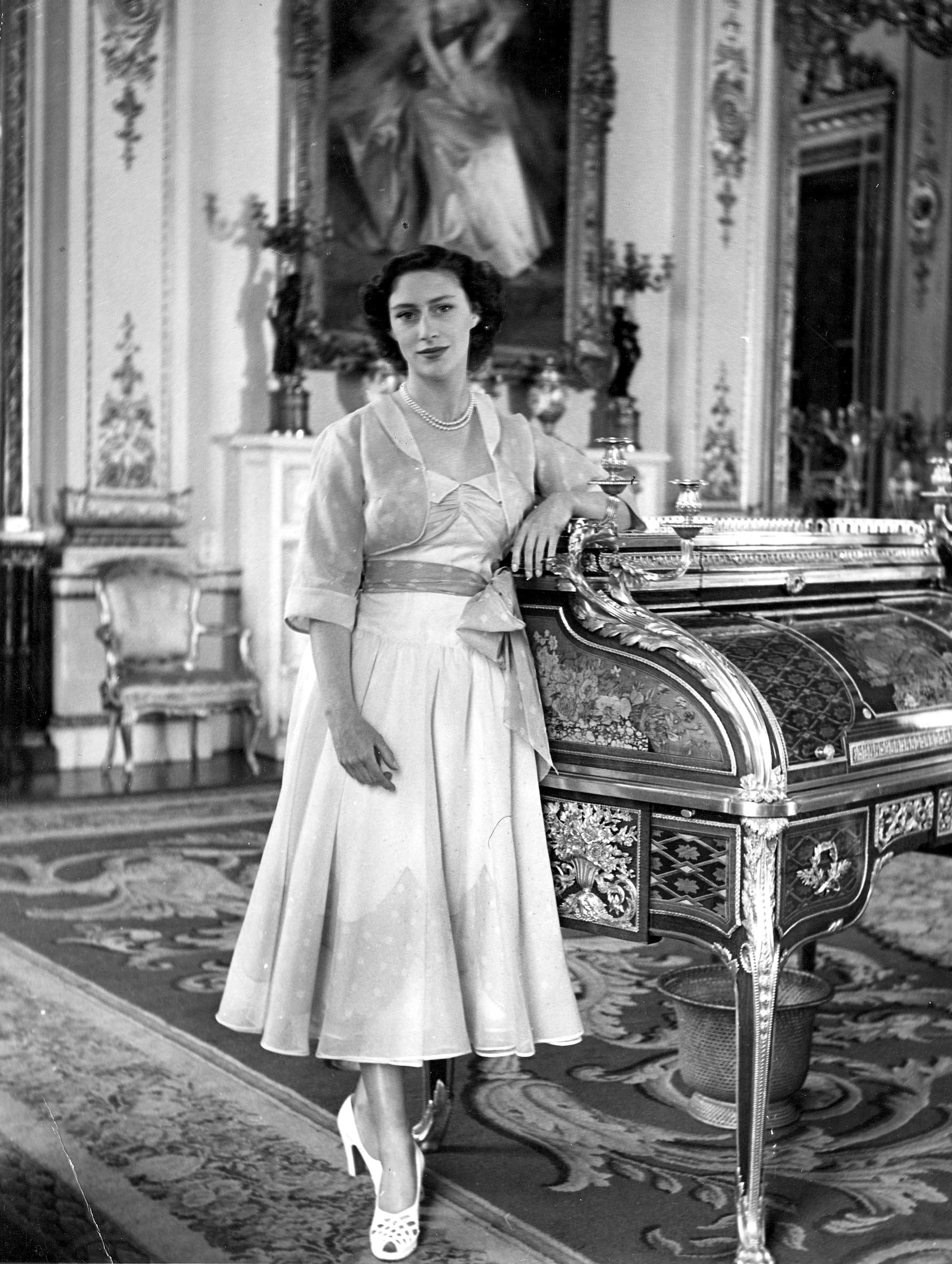<p>Shortly before the death of her father and accession of her sister, Princess Margaret posed for a 21st birthday portrait inside Glamis Castle in Scotland in 1951. Glamis is the childhood home of her mother, Queen Elizabeth the Queen Mother, and is where Margaret was born in 1930.</p>