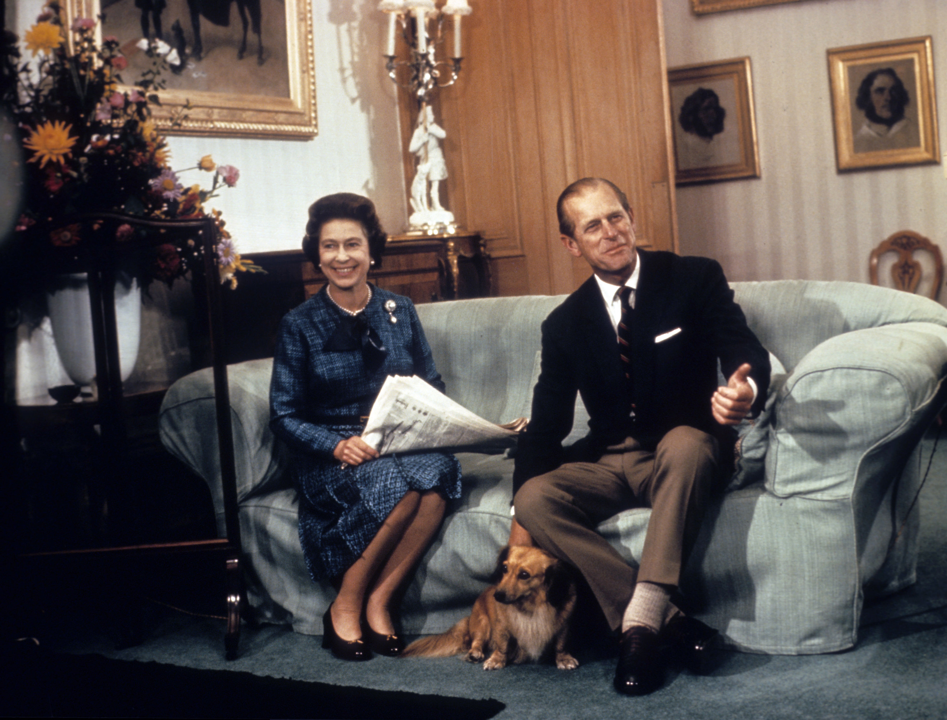 <p>Here's another peek inside Balmoral: This photo was taken as Queen Elizabeth ll and Prince Philip, Duke of Edinburgh, relaxed with one of their many dogs while on holiday in Scotland on Sept. 26, 1976.</p>