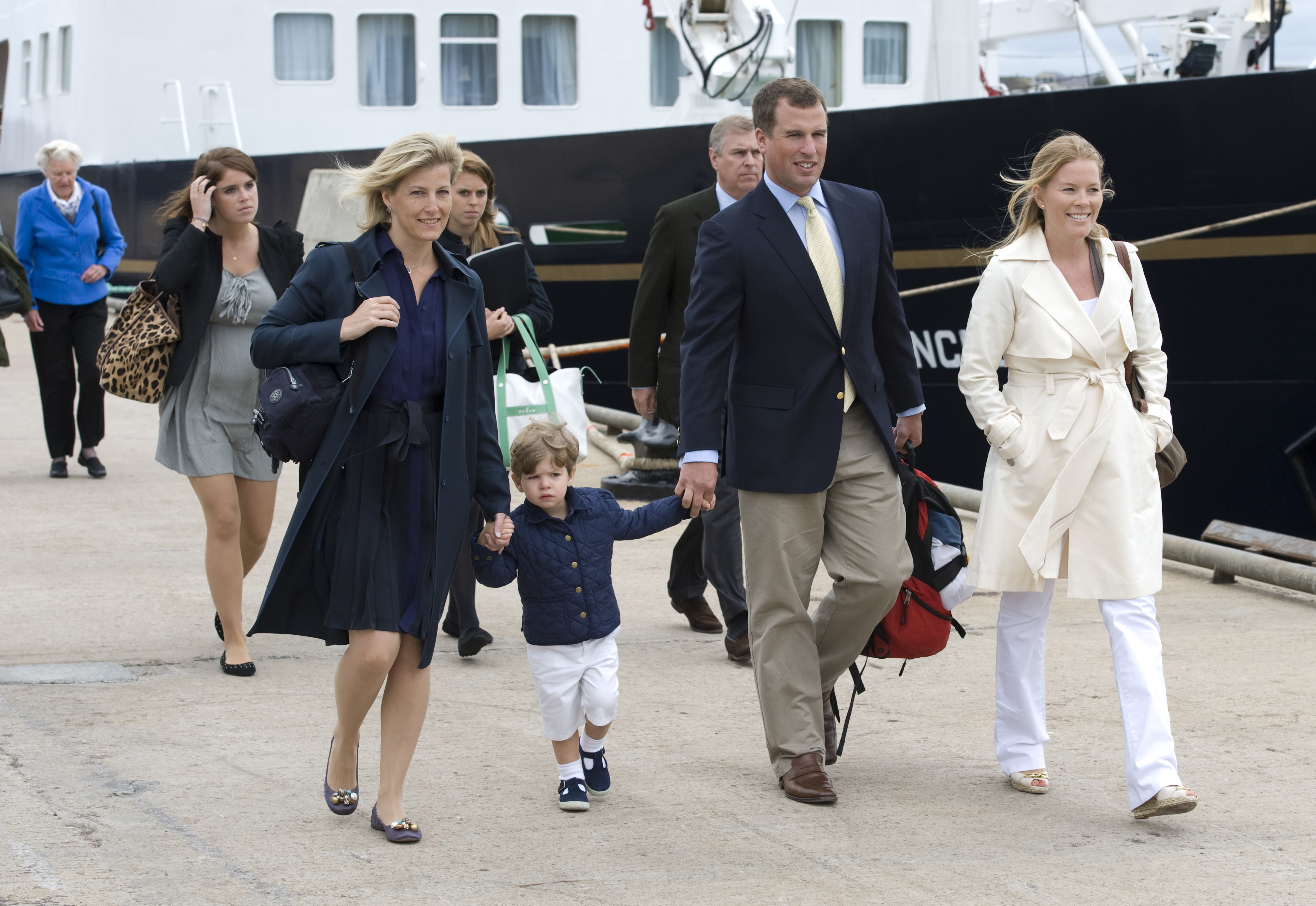 <p>Princess Eugenie, Sophie, Countess of Wessex, Princess Beatrice, James, Viscount Severn, Prince Andrew, Peter Phillips and Autumn Phillips disembarked in Scrabster, Scotland, on Aug. 2, 2010, after joining the queen on a two-week cruise to celebrate the 50th birthday of Prince Andrew and the 60th birthday of Princess Anne.</p>