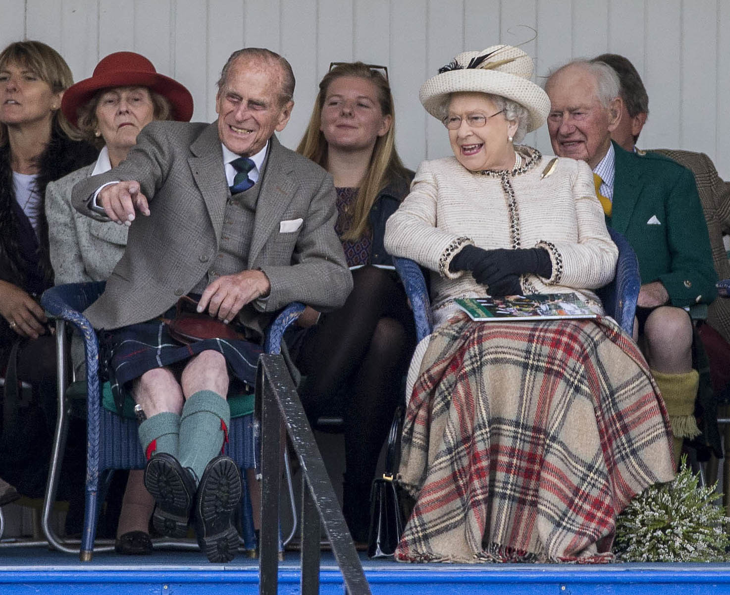 <p>An incredible 67 years later, Prince Philip and Queen Elizabeth II were side by side again, this time to watch the children's sack race at the Braemar Highland Gathering in Scotland on Sept. 6, 2014.</p>