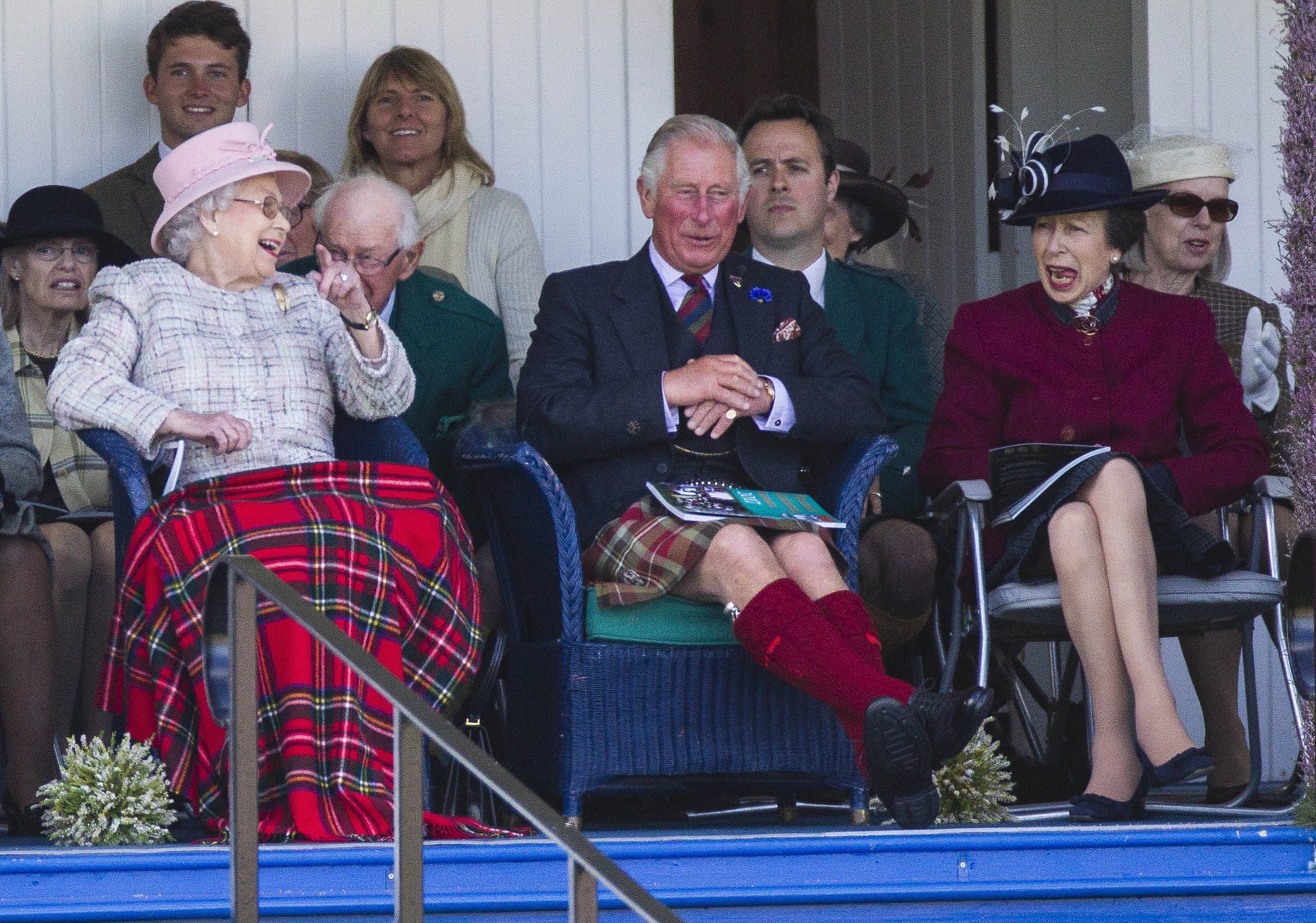 <p>Fifty-five years later, Queen Elizabeth II attended the same event with Princess Anne and Prince Charles. They really seemed to enjoy the sack race at the Braemar Highland Gathering in Scotland on Sept. 2, 2017.</p>