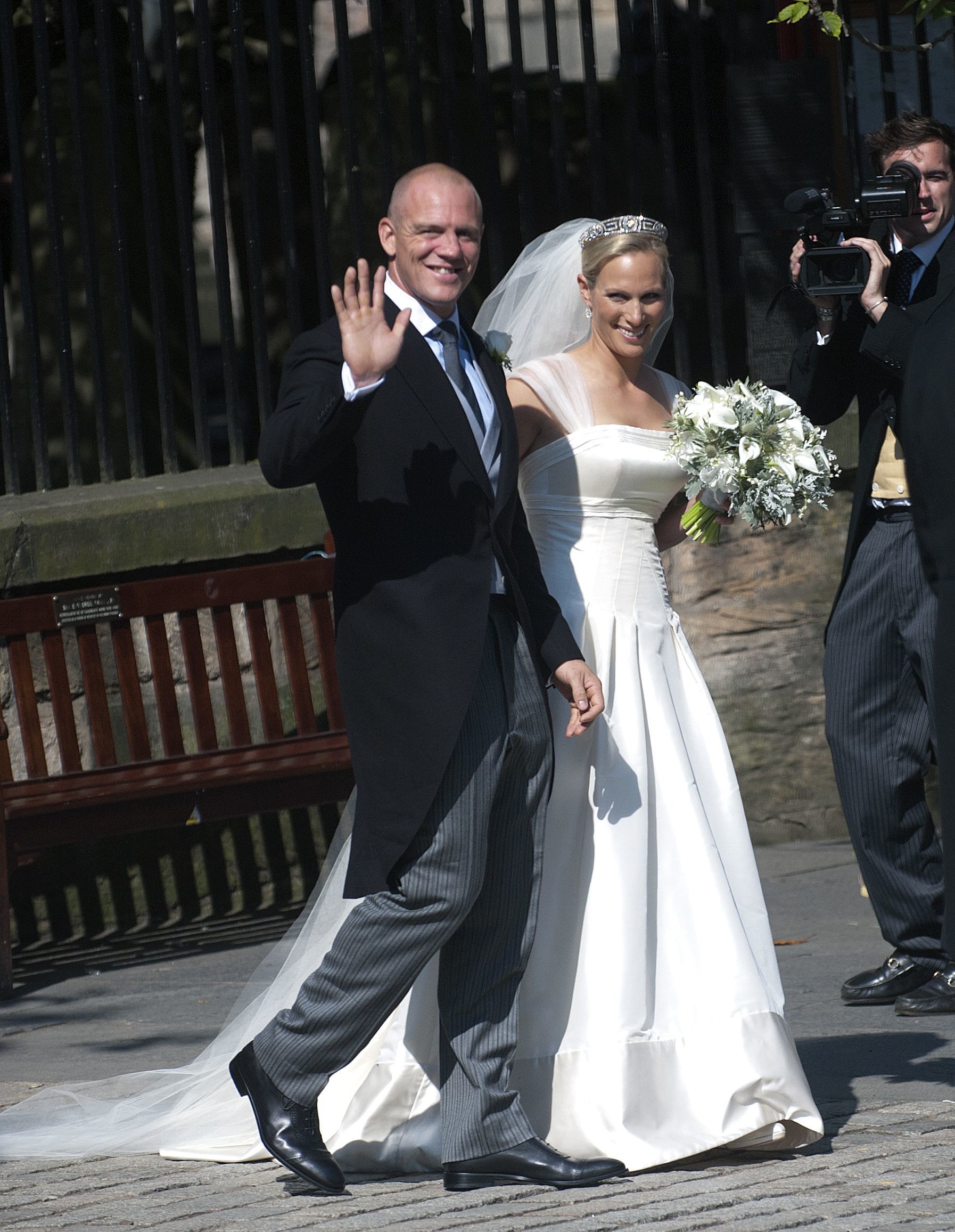 <p>Princess Anne's daughter, Zara Phillips, is pictured on her wedding day with new husband Mike Tindall outside Canongate Kirk in Edinburgh, Scotland, on July 30, 2011.</p>