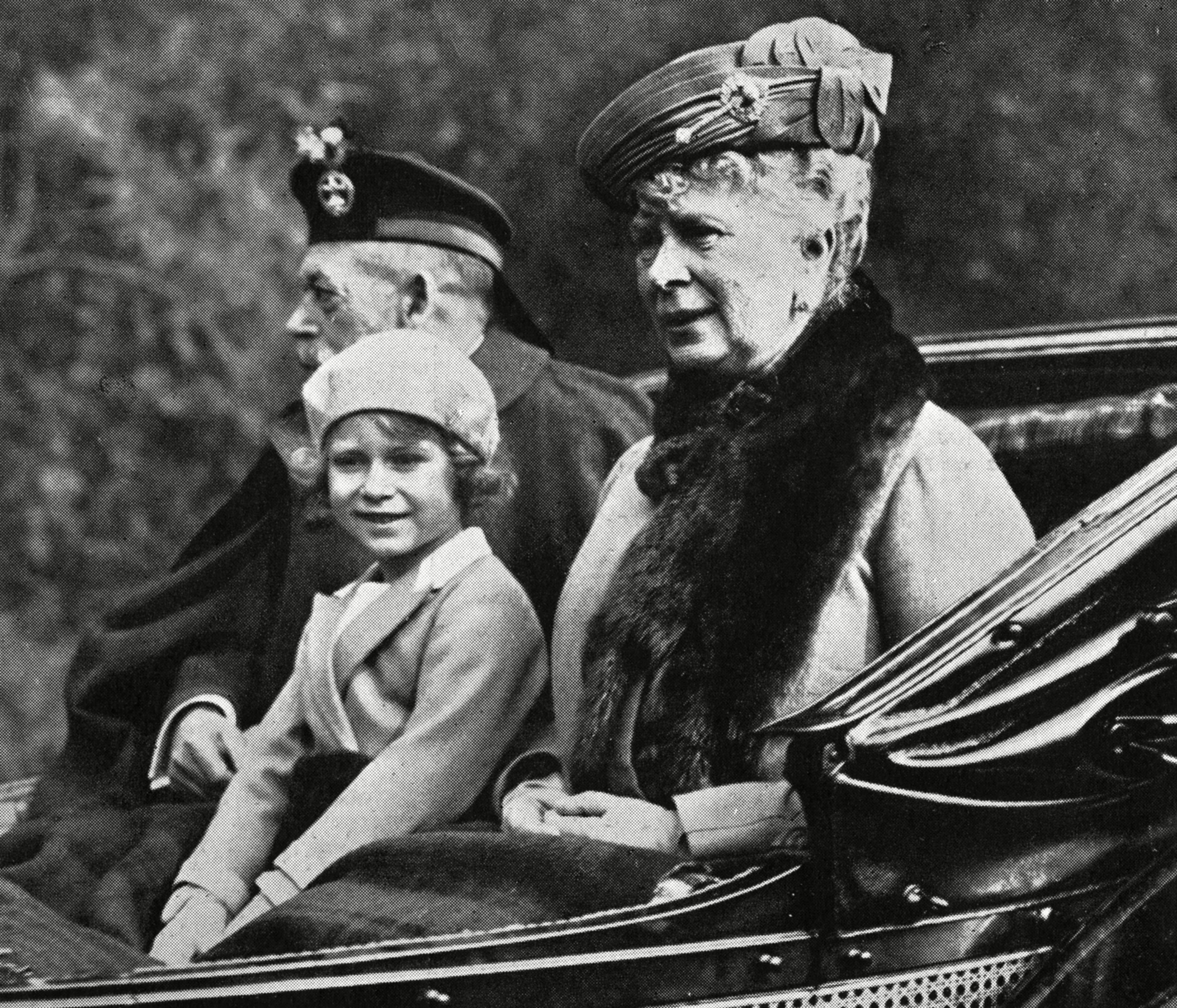 <p>Accompanied by grandmother Queen Mary and grandfather King George V, young Princess Elizabeth -- later Queen Elizabeth II -- traveled by carriage to a service at Crathie Church during a stay at Balmoral in Scotland in 1932.</p>