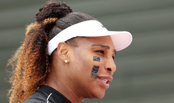 why is serena williams wearing face stickers? 'it's not easy'