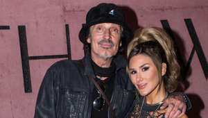 Tommy Lee broke four ribs carrying his wife's luggage