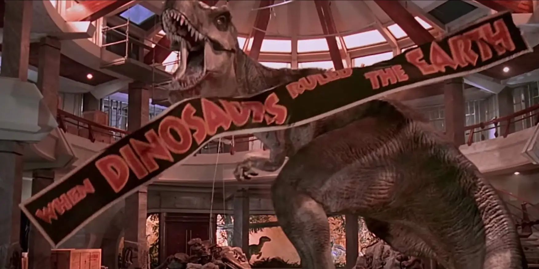 <p>If you were fortunate enough to catch <a href="https://www.imdb.com/title/tt0107290/?ref_=nv_sr_srsg_0"><em>Jurassic Park</em></a> in theatres, you probably remember cheering when the big bad T-Rex actually comes to save the day for the humans. She <a href="https://www.youtube.com/watch?v=gTWo9oLJOWk&list=PLZbXA4lyCtqrd-fXvh6kIIEpRDBLEnJs9&index=10">makes short work of the raptors </a>that cornered the group, and gives a triumphant roar as a banner with the words “When Dinosaurs Ruled The Earth” falls in front of her. </p>