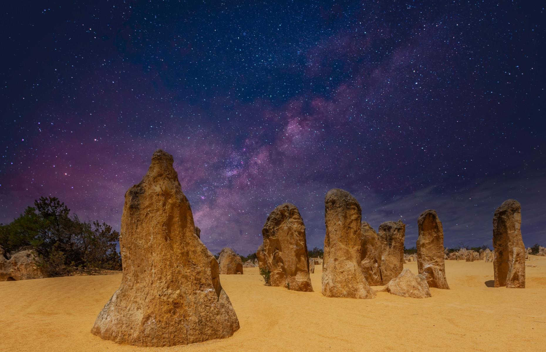 <p>Western Australia is home to some pretty wild looking topography and the Pinnacles Desert of <a href="https://parks.dpaw.wa.gov.au/park/nambung">Nambung National Park</a> are a prime example. The desert’s “pinnacle” formations are limestone spires that stick straight out of the ground and there are thousands of them to behold. With a lake filled with equally strange formations built by micro-organisms, as well as coastal dunes, flowering plants and gorgeous beaches, this park is truly one of a kind.</p>