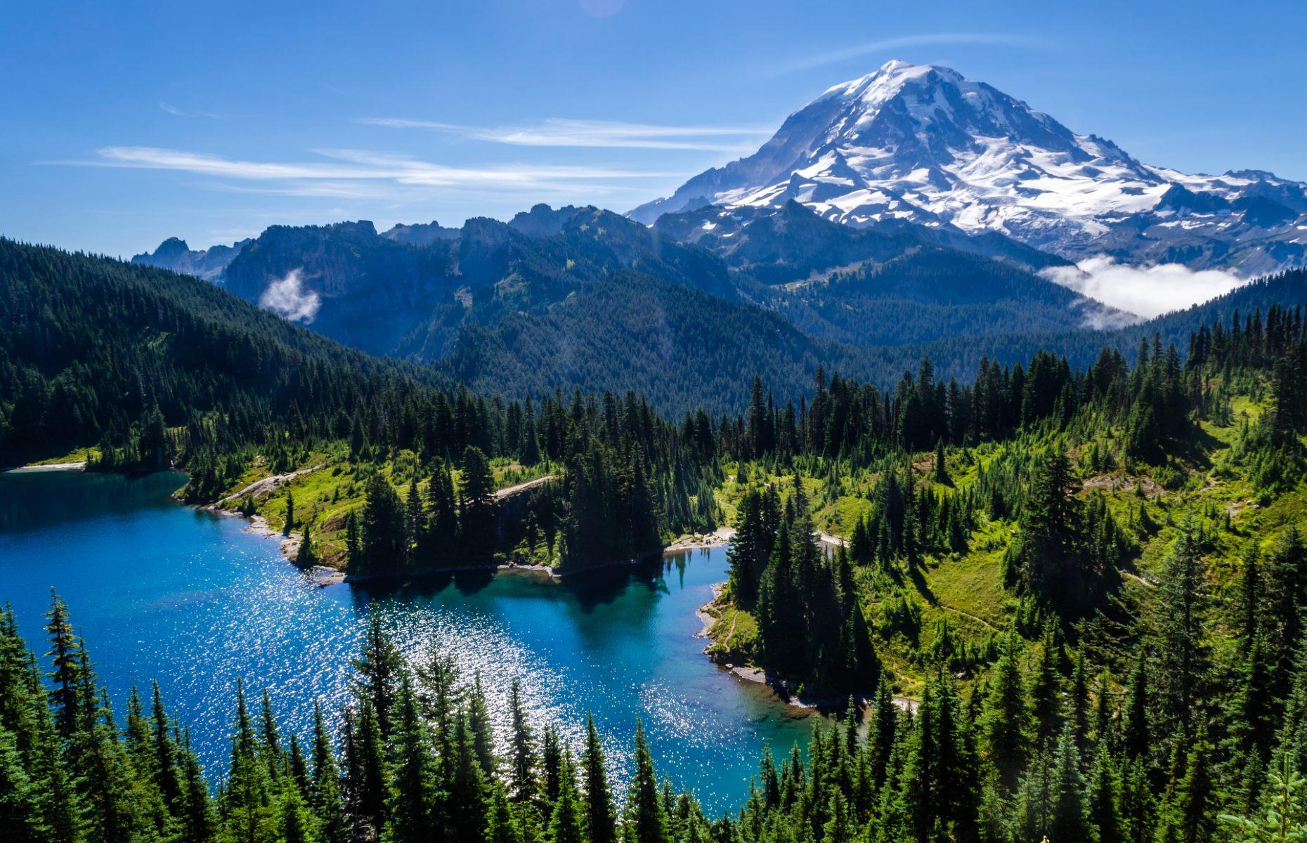 <p>Part of the iconic Washington landscape, Mount Rainier is an active volcano with a surrounding national park that features incredible wildlife. With over 275 miles (440km) of hiking trails that lead through verdant forest and subalpine ridges, your visit will be full of discovery and adventure. <a href="https://www.nps.gov/mora/index.htm">Mount Rainier National Park</a> has five developed areas where you can find a museum, climbing centers and ranger stations, alongside three major drive-in campgrounds for you to pitch up with your RV and stay the night. </p>