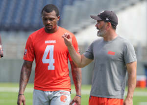 Browns quarterback Deshaun Watson talks with head coach Kevin Stefanski after minicamp on Wednesday, June 15, 2022 in Canton.