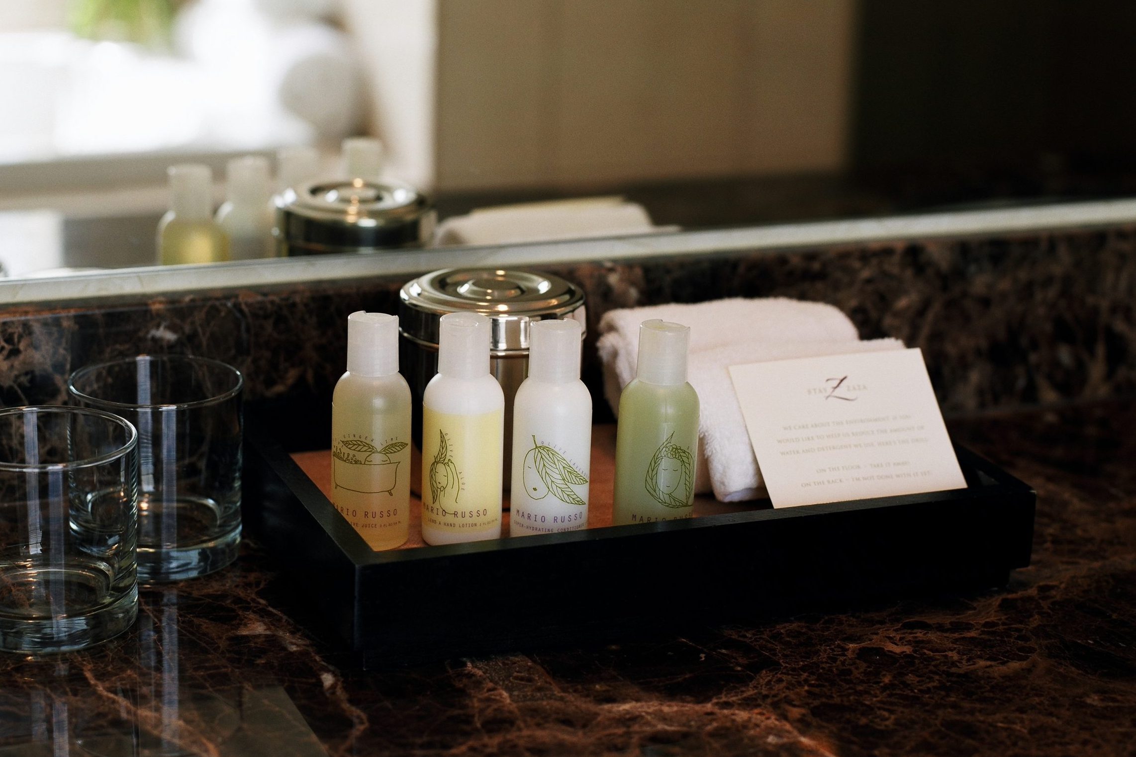 <p>Much like the mini soaps stocked in the bathroom, the travel-size shampoo and conditioner are also fine to take from your hotel room. Hotels sometimes brand these items too, Conteh says. So taking their shampoos and sporting the hotel brand name can help spread the word about a hotel. This goes for <a href="https://www.rd.com/article/motel-vs-hotel/">motels</a> too.</p>