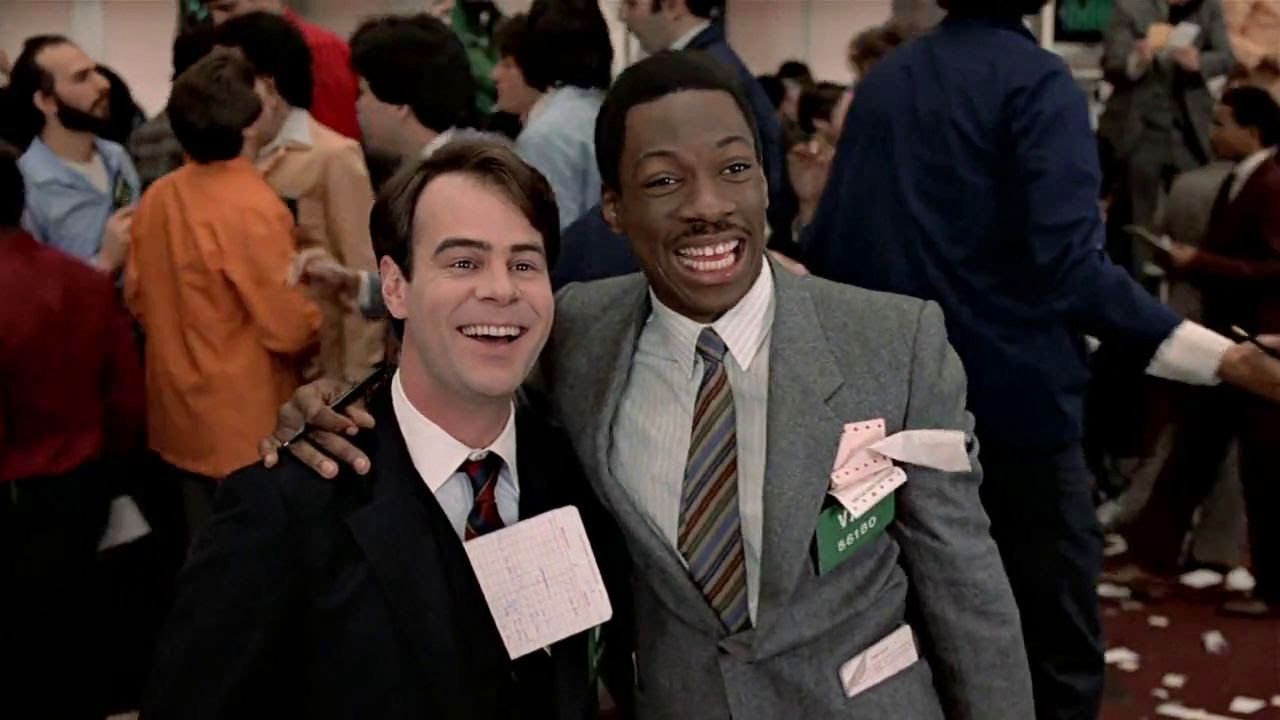 <p>                     After becoming the pawns in a sinister game carried out by a pair of brothers in which they are forced to switch places, Louis Winthorpe III (Dan Aykroyd) and Billy Ray Valentine (Eddie Murphy) team up, not to get even, but to get revenge.                   </p>                                      <p>                     Directed by John Landis, Trading Places has one of the most sinister Wall Street centric stories to come out in the 1980s (and that is saying something), but the performances by Eddie Murphy and Dan Aykroyd turn it into not only one of the best New York movies but one of the greatest comedies of all time.                   </p>