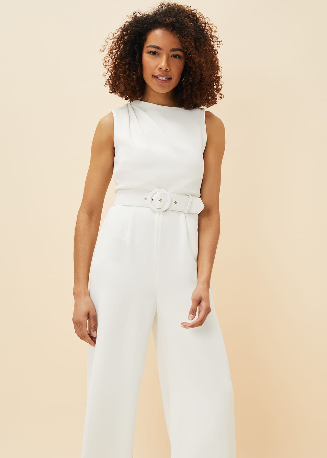 <p><strong>£169.00</strong></p><p><a href="https://www.phase-eight.com/product/gracie-wide-leg-jumpsuit-221021106.html#q=jumpsuit&is=false&sz=60&start=0&isSecondPage=false&pid=221021106&pos=8">Shop Now</a></p><p>Love the look of a white gown but not the fuss? This jumpsuit has pleated wide-leg pants that’ll swish just as elegantly as any skirt while you walk down the aisle. The statement belt and subtle boat neck are a nice touch, too.</p>