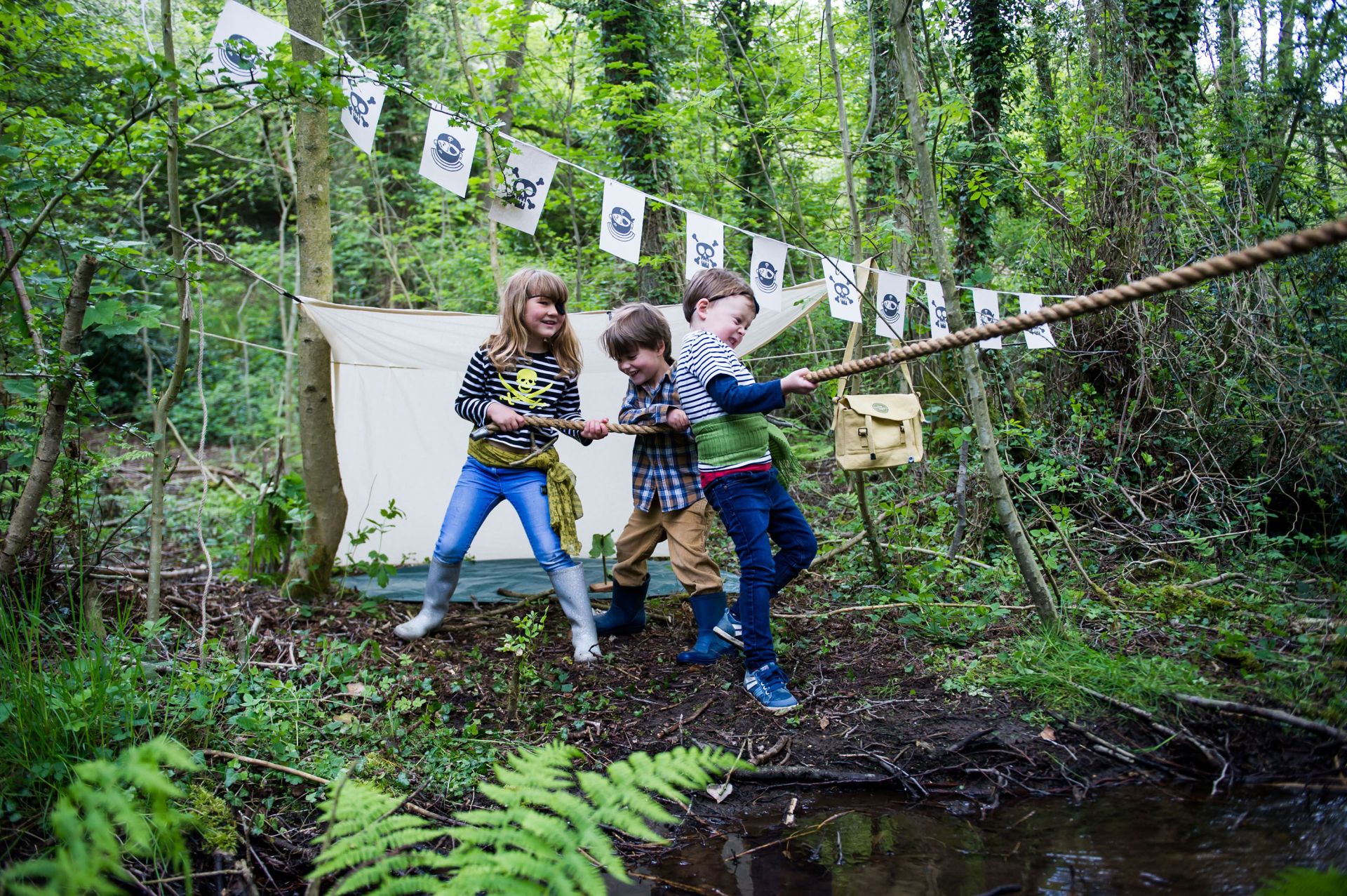 <p>                     Encourage your kids to sail the ships and conquer land with a fun-filled pirate adventure. Ahoy, me hearties!                   </p>                                      <p>                     String up some flags between trees, provide a couple of eye patches and allow their imaginations to run wild as they embark on a treasure-finding quest. How about a sea shanty or two? Ready-made den kits can be found online and will provide even more pirate-themed fun.                   </p>