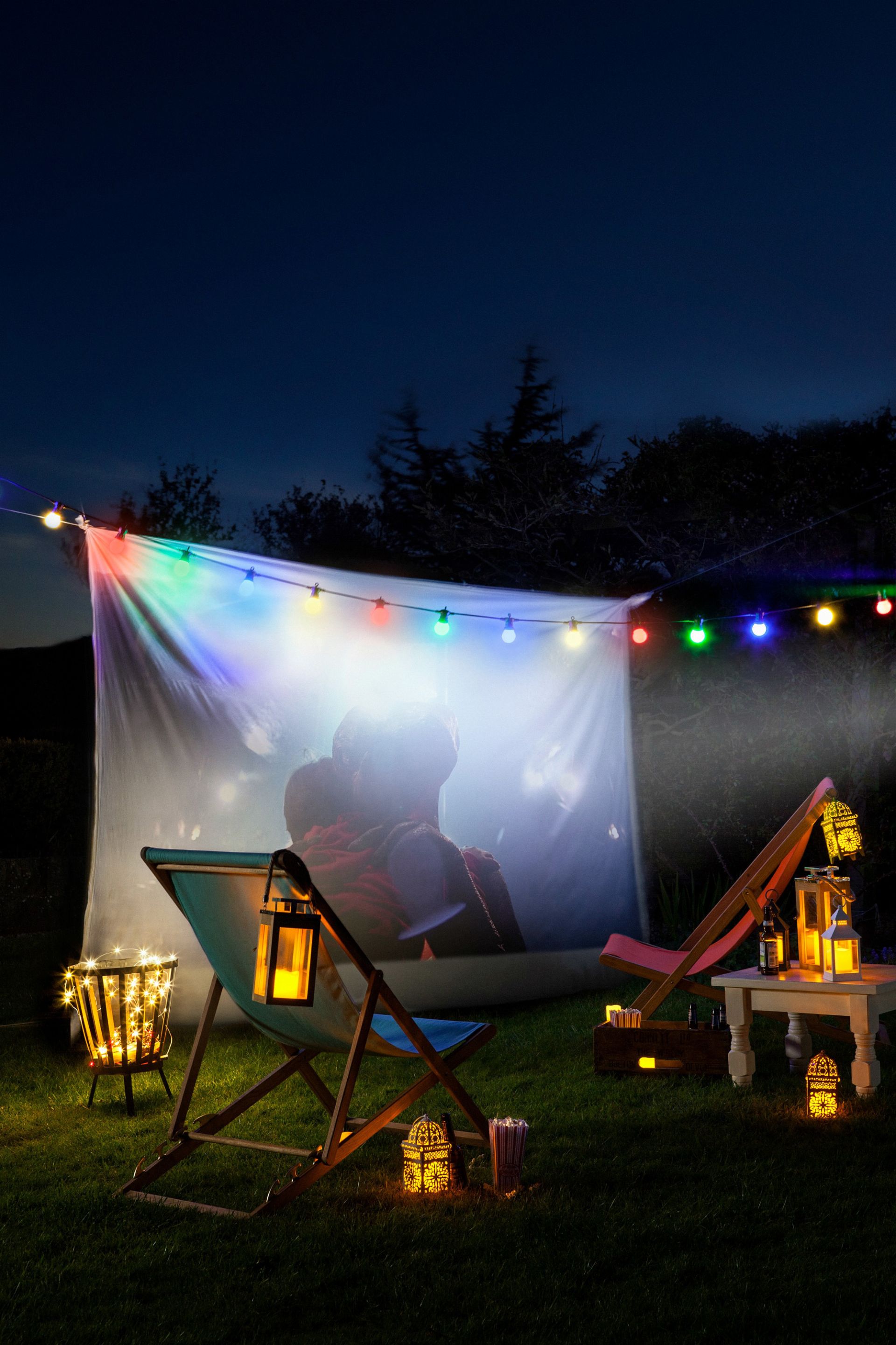 <p>                     If you're looking for more garden activities for kids that all the family can enjoy, then nothing beats snuggling up together for a film night. Moving it outside to the garden will turn the experience into something to remember. Easy to set up, all you need is a white sheet thrown over a washing line and the best outdoor projector.                    </p>                                      <p>                     Set the scene with lots of magical garden lighting ideas. Multi-colored festoon lights add a special touch that children will love. Dot around some lanterns too for a fairytale vibe, then pile up the blankets and throws. And don't forget the popcorn!                   </p>